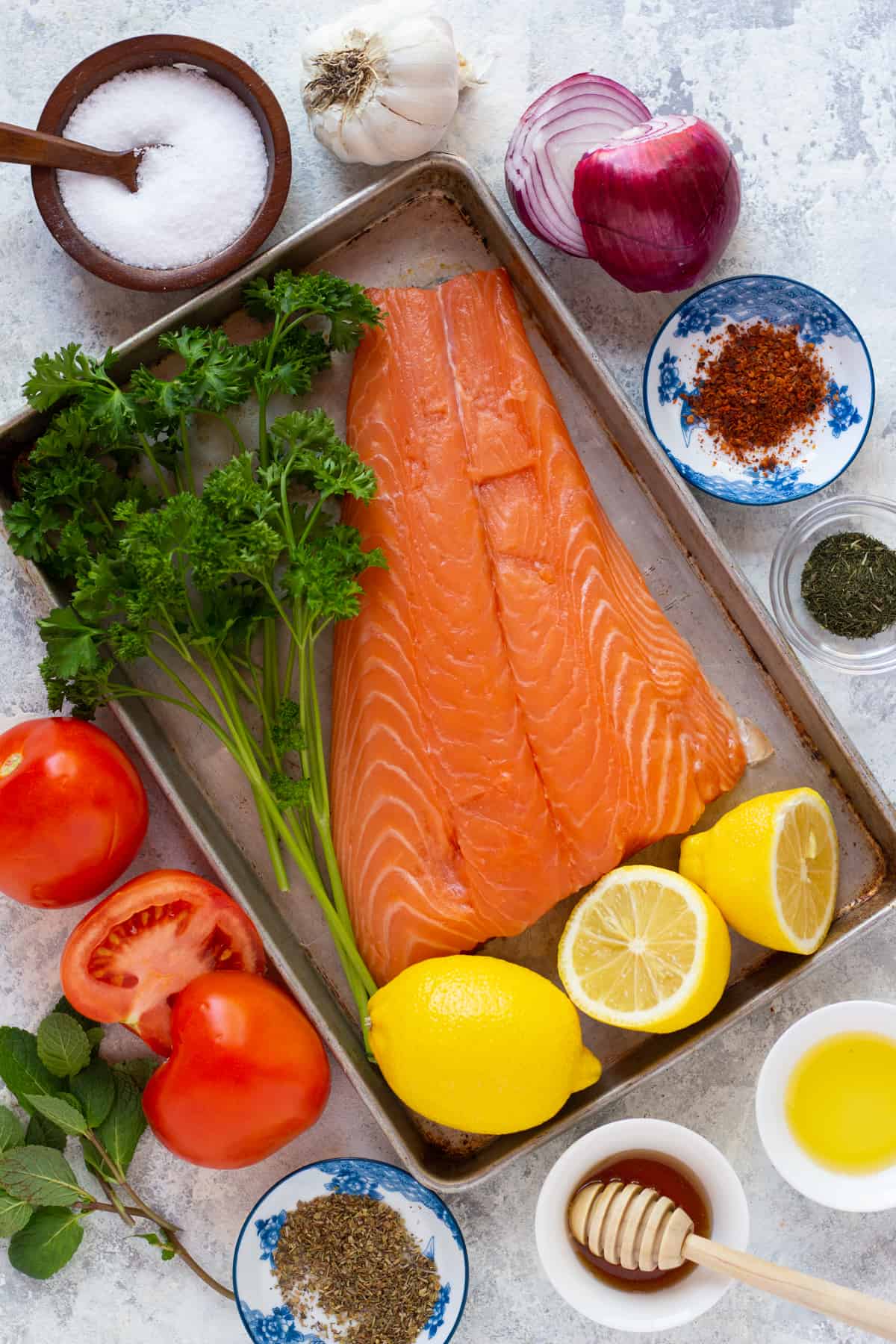 to make salmon marinade you need salmon, lemon juice, olive oil, garlic, spices and herbs.