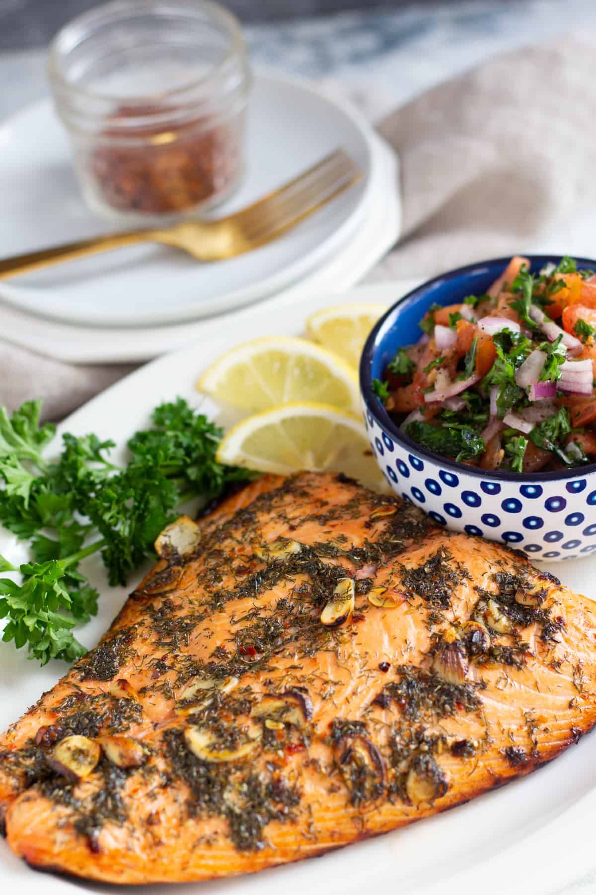 This salmon marinade features bright flavors and doesn't require a long list of ingredients. You can use this marinade for baked or grilled salmon. 

