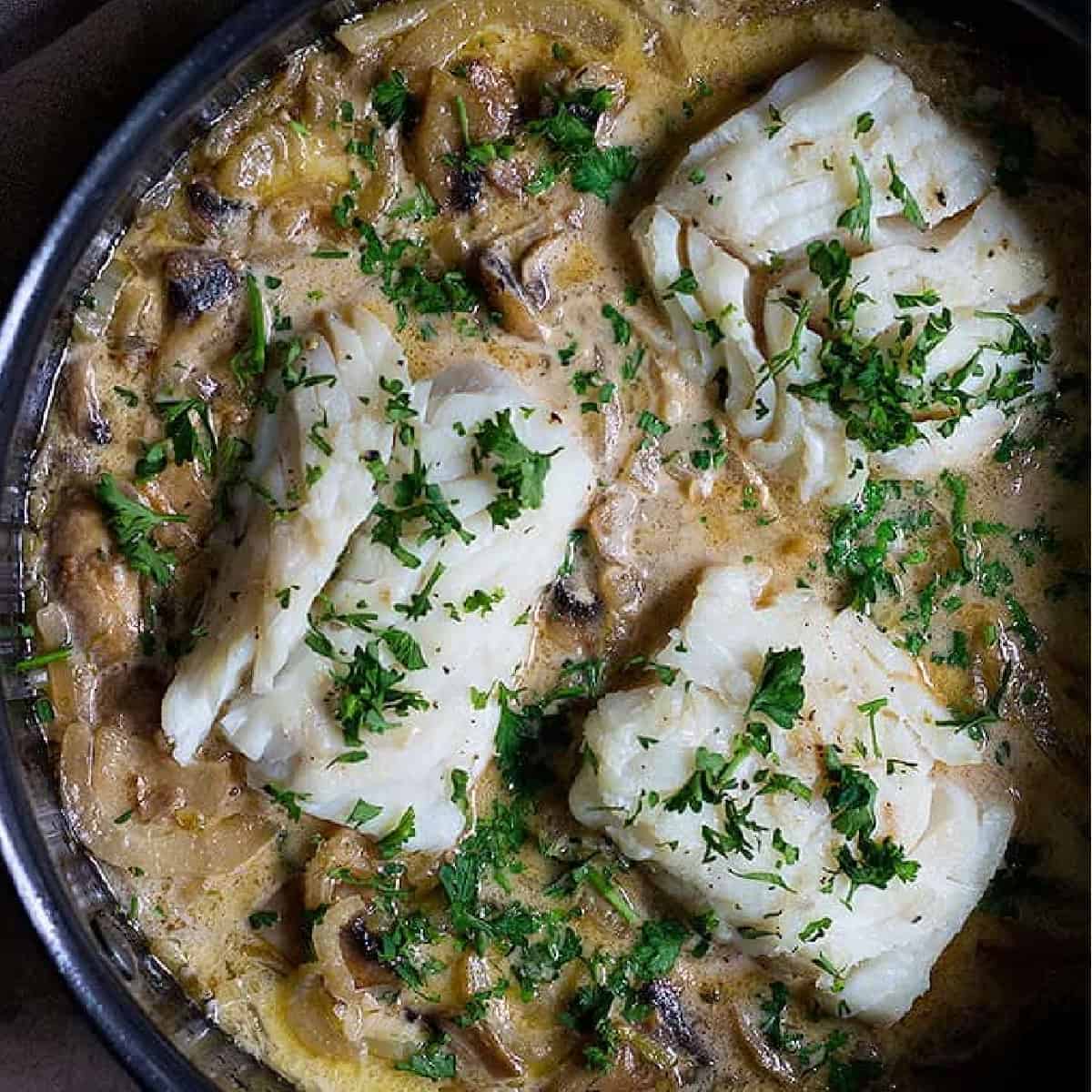 This pan seared cod is cooked in a flavorful shallot, fennel and mushroom sauce and served with some dill rice. This simple cod recipe makes the perfect dinner is less than one hour. 
