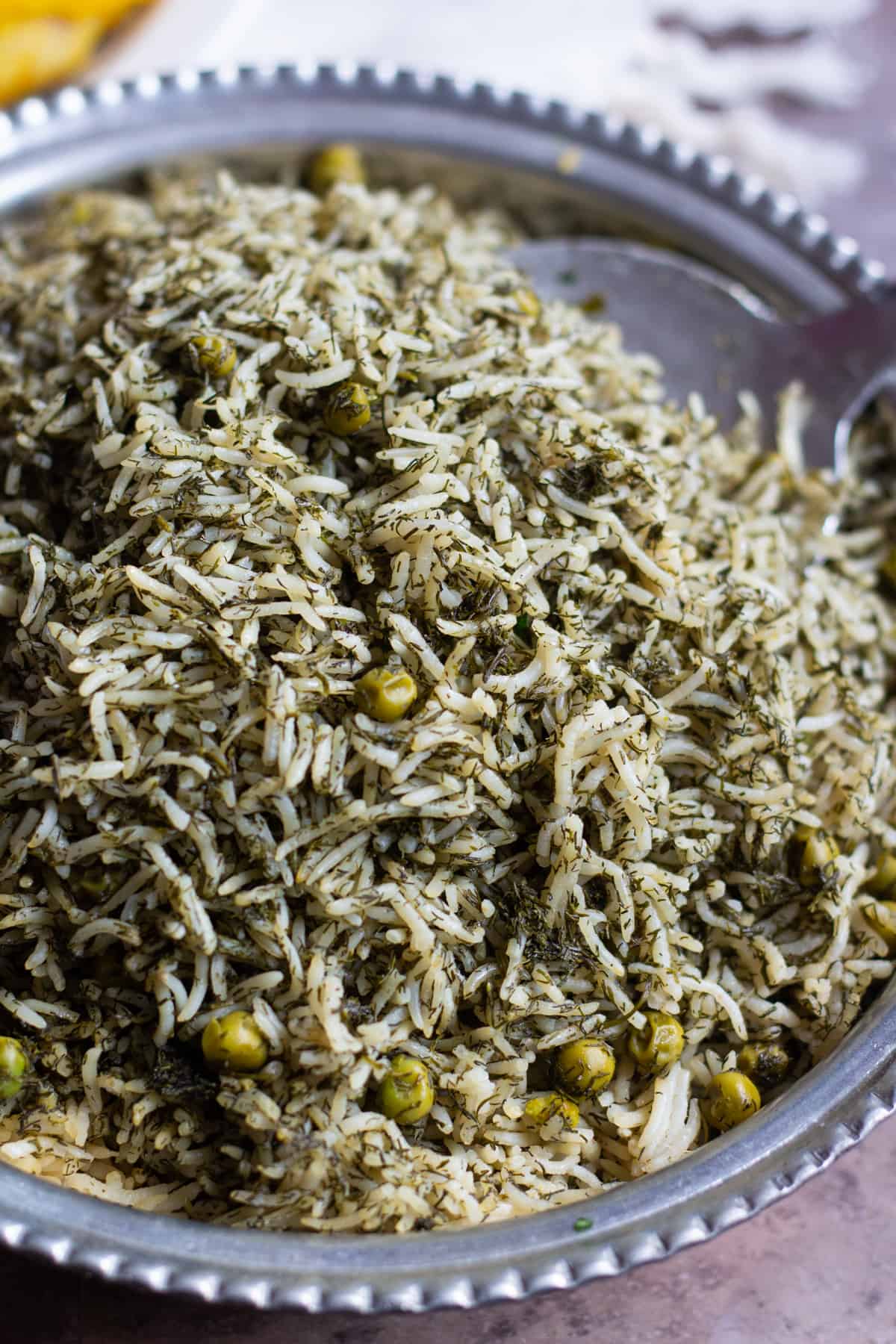 Dill rice with peas is a vegan Persian recipe that is made in one pot with only 5 ingredients. This simple, aromatic side dish is ready in 30 minutes and is perfect for any occasion and you can serve it with chicken, beef or seafood.