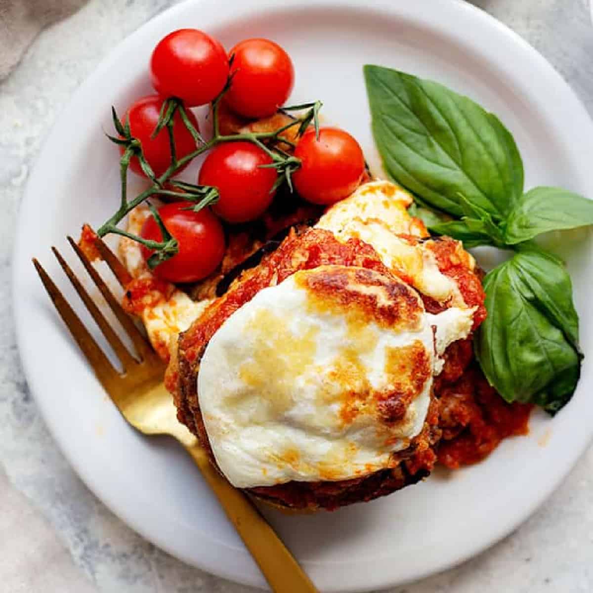 This eggplant parmesan recipe is a classic for good reasons. You can't go wrong with layers of eggplant, cheese and marinara sauce. Learn how to make this eggplant casserole with this easy tutorial (including a special tip that makes this dish special!) and how-to video. 
