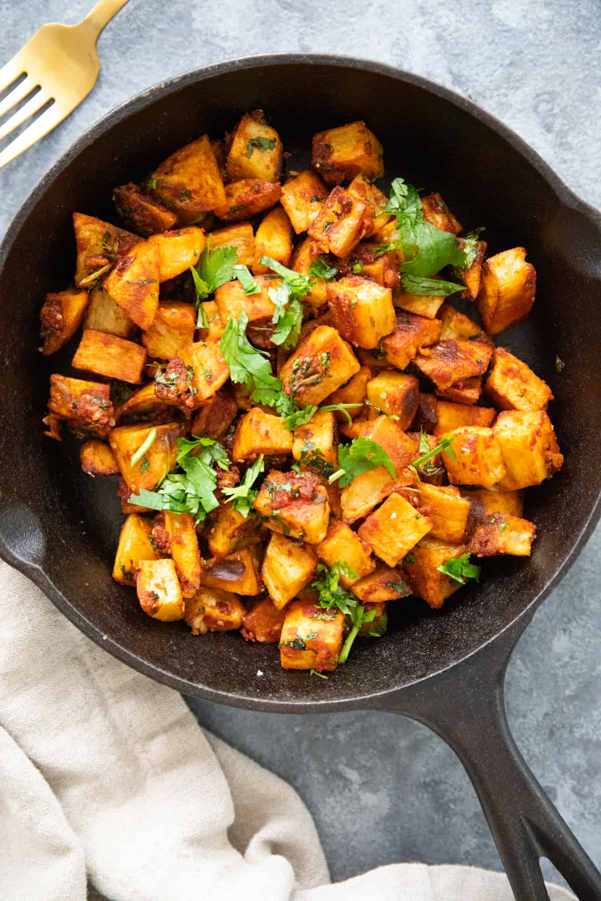 overhead shot of batata harra in a skillet. 