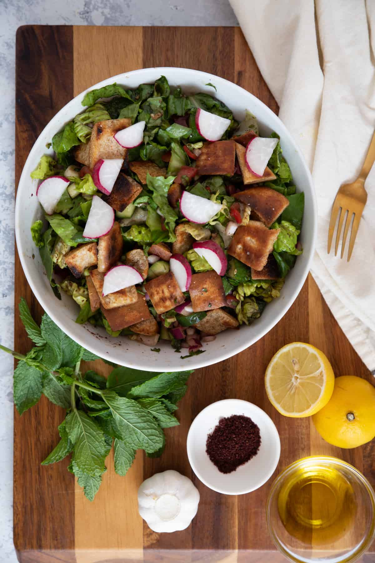 Fattoush is a simple Middle Eastern chopped salad that's perfect for any meal. This Fattoush recipe is easy to follow and uses seasonal fresh ingredients.