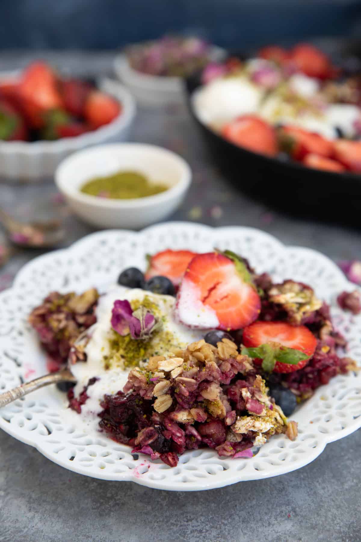 Front shot of berry crisp in a plate.