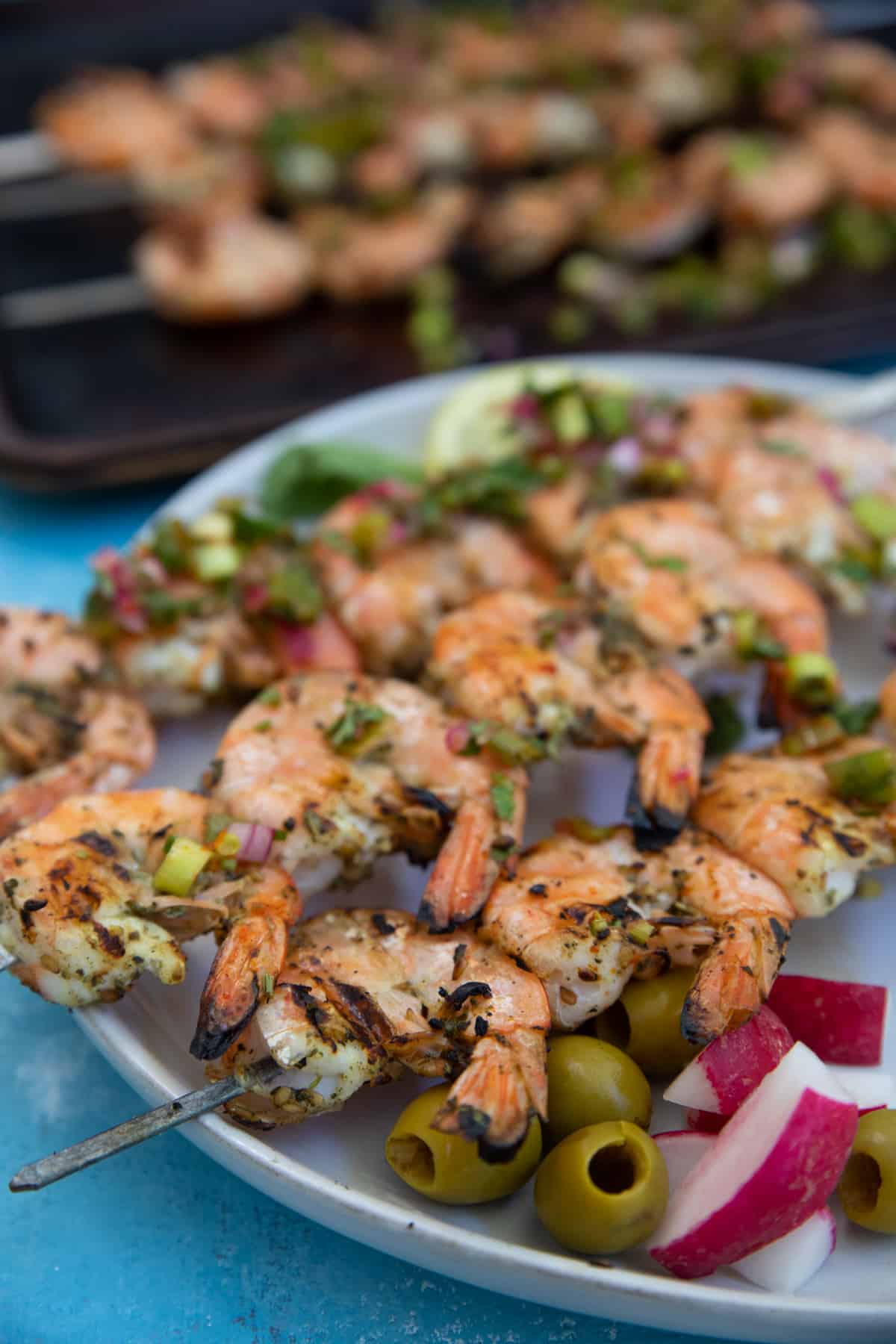 closeup shot of grilled shrimp skewers. 