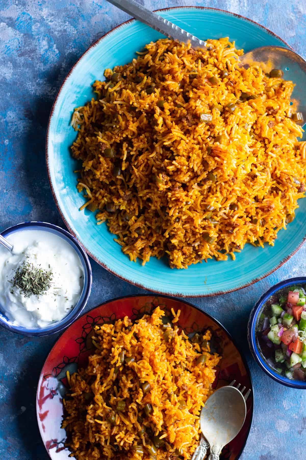 Serve lubia polo with salad shirazi and yogurt. 