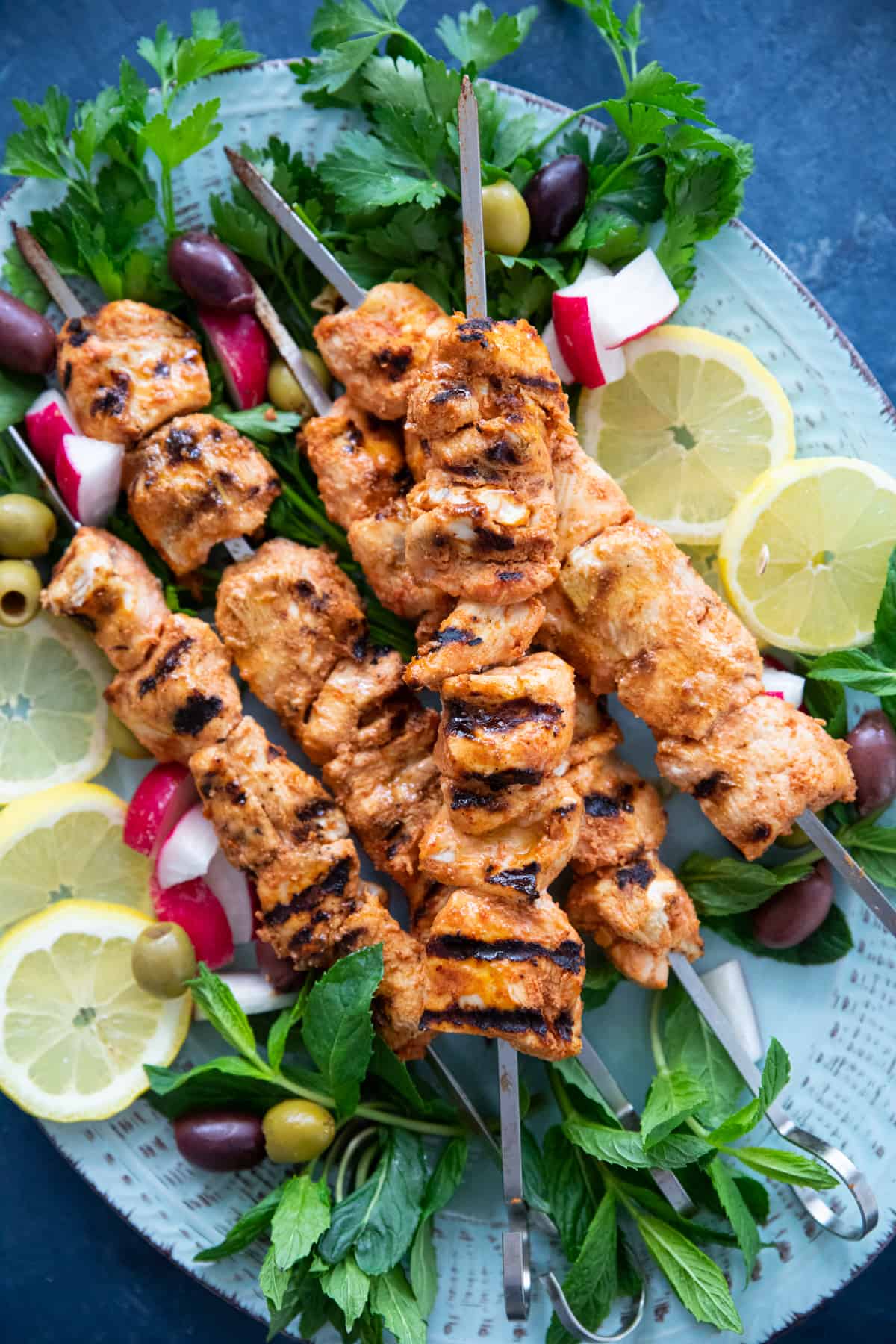 These juicy grilled chicken kabobs are a staple of Mediterranean and Middle Eastern cooking. I've marinated these cubes of chicken in Mediterranean spices and grilled them to perfection. You can easily double or triple this recipe to feed a crowd!

