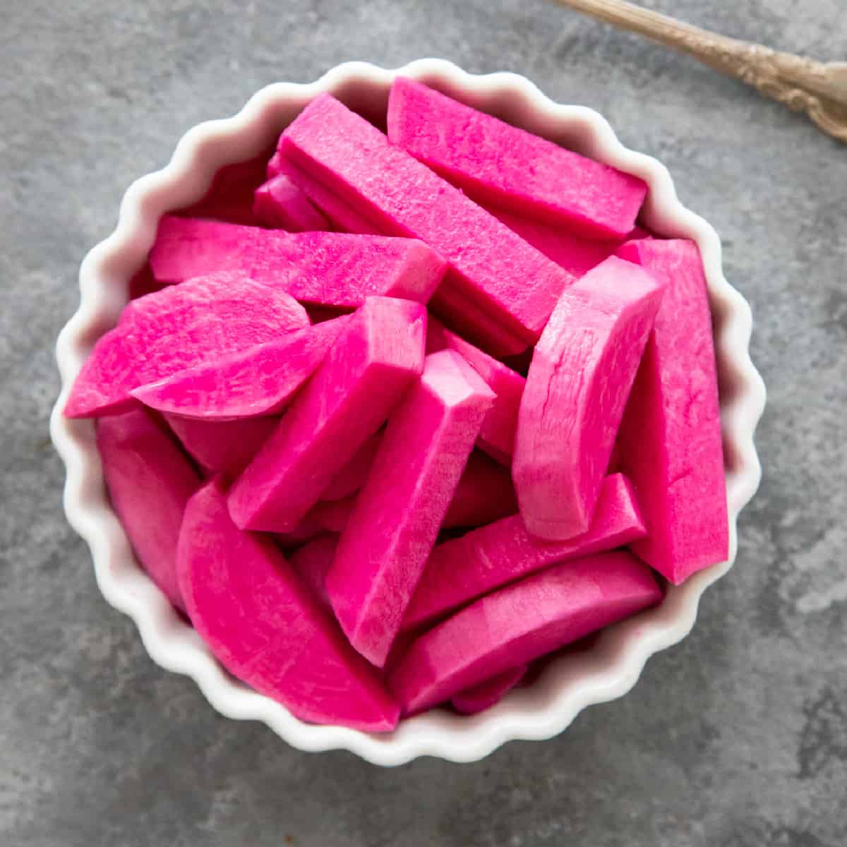 Middle Eastern pickled turnips in a bowl.