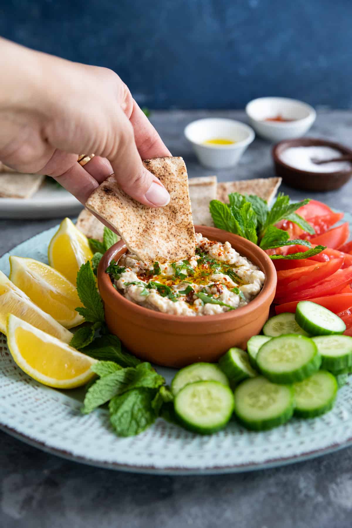 Mutabal is a Middle Eastern eggplant dip with a nice smoky flavor. It's different from baba ganoush and can be served with fresh pita bread as an appetizer or on a mezze platter for a tasty feast!