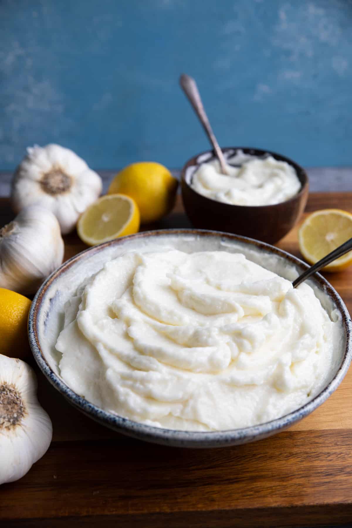 front shot of toum Lebanese garlic sauce with ingredients.
