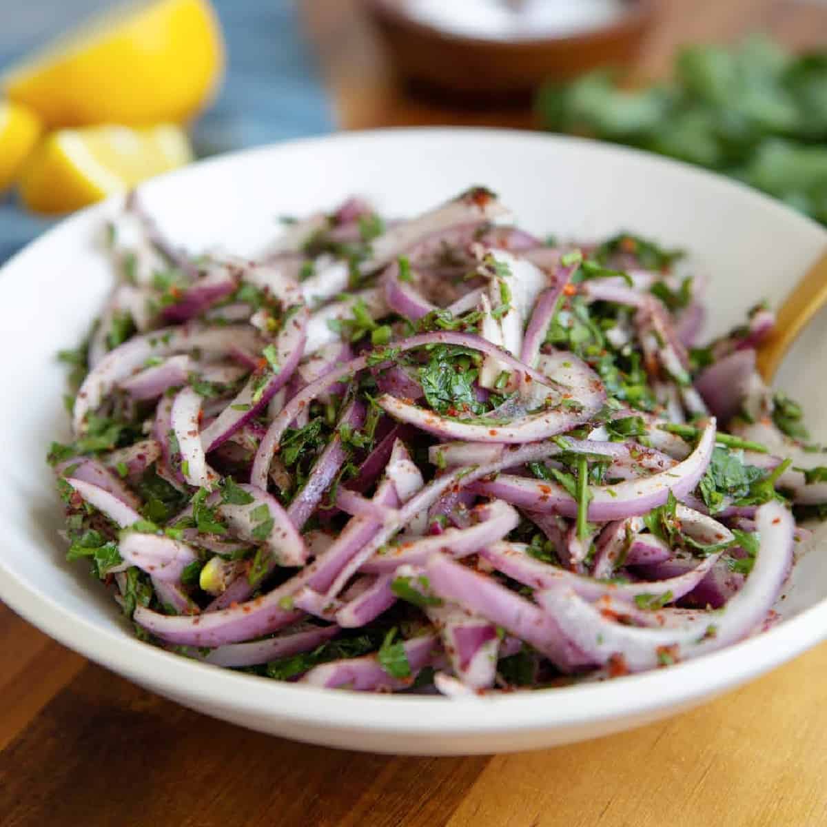Turkish sumac onions are ready in 10 minutes and make an ideal companion to a wide variety of dishes. Crispy red onions are marinated with lemon juice, sumac and herbs - all you need to add a lot of bright flavors to any dish!
