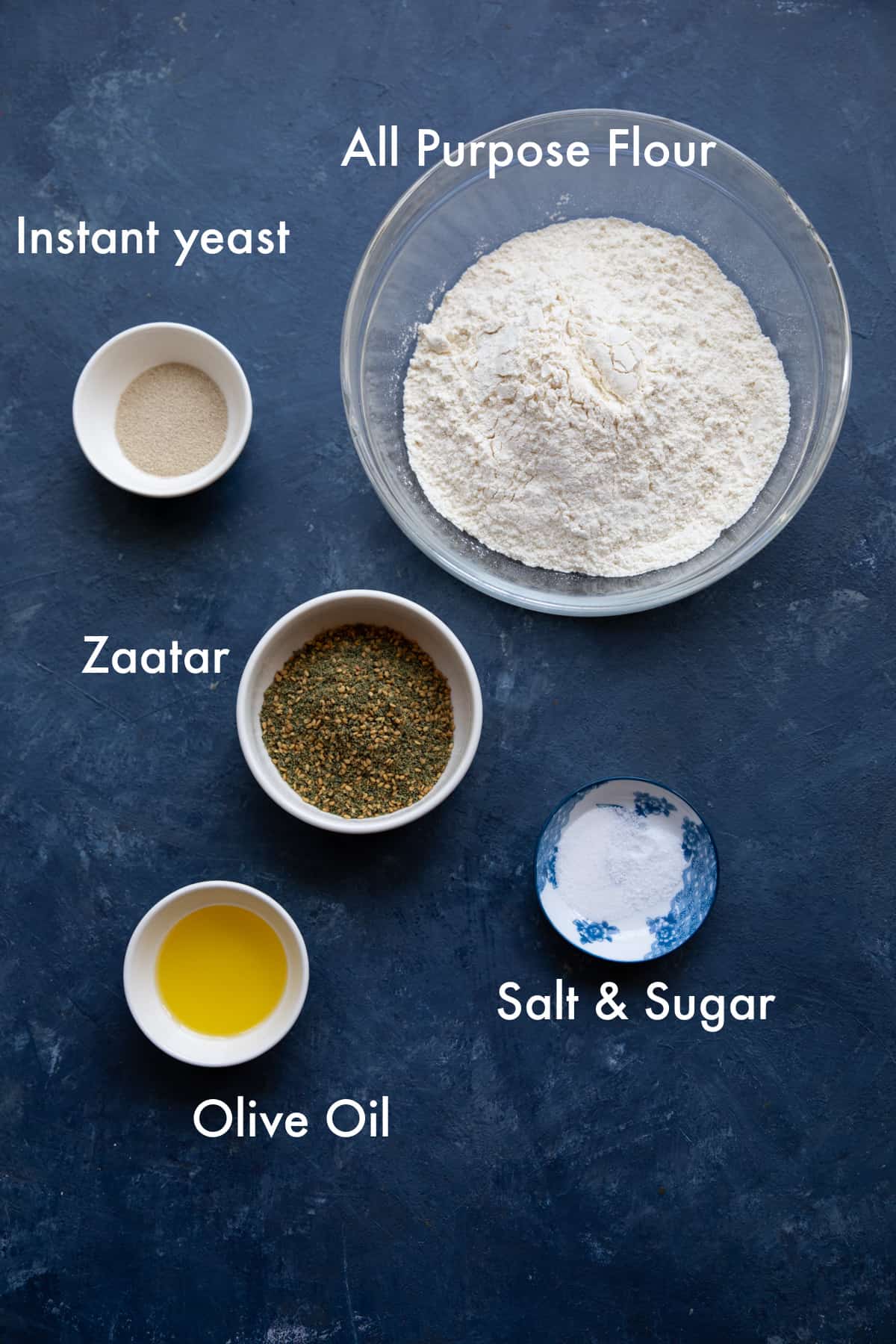 to make this recipe you need flour, salt, sugar, water, olive oil and zaatar.