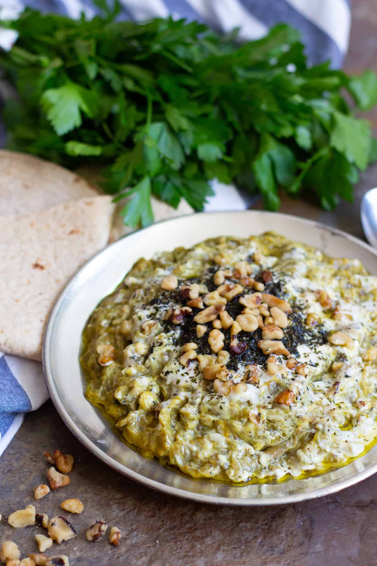 Kashke Bademjan is an easy Persian eggplant dip made of eggplants, kashk, onion and garlic. 