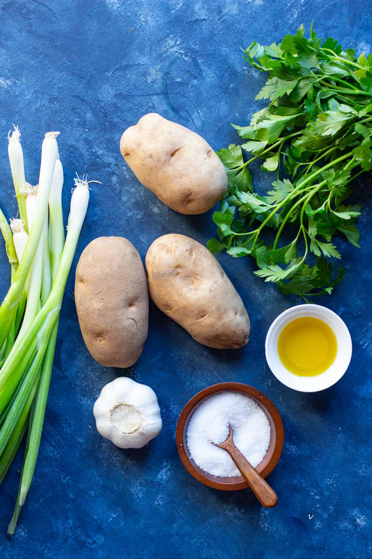 Ingredients to make skordhalia are potatoes, garlic, olive oil, lemon juice, salt and herbs