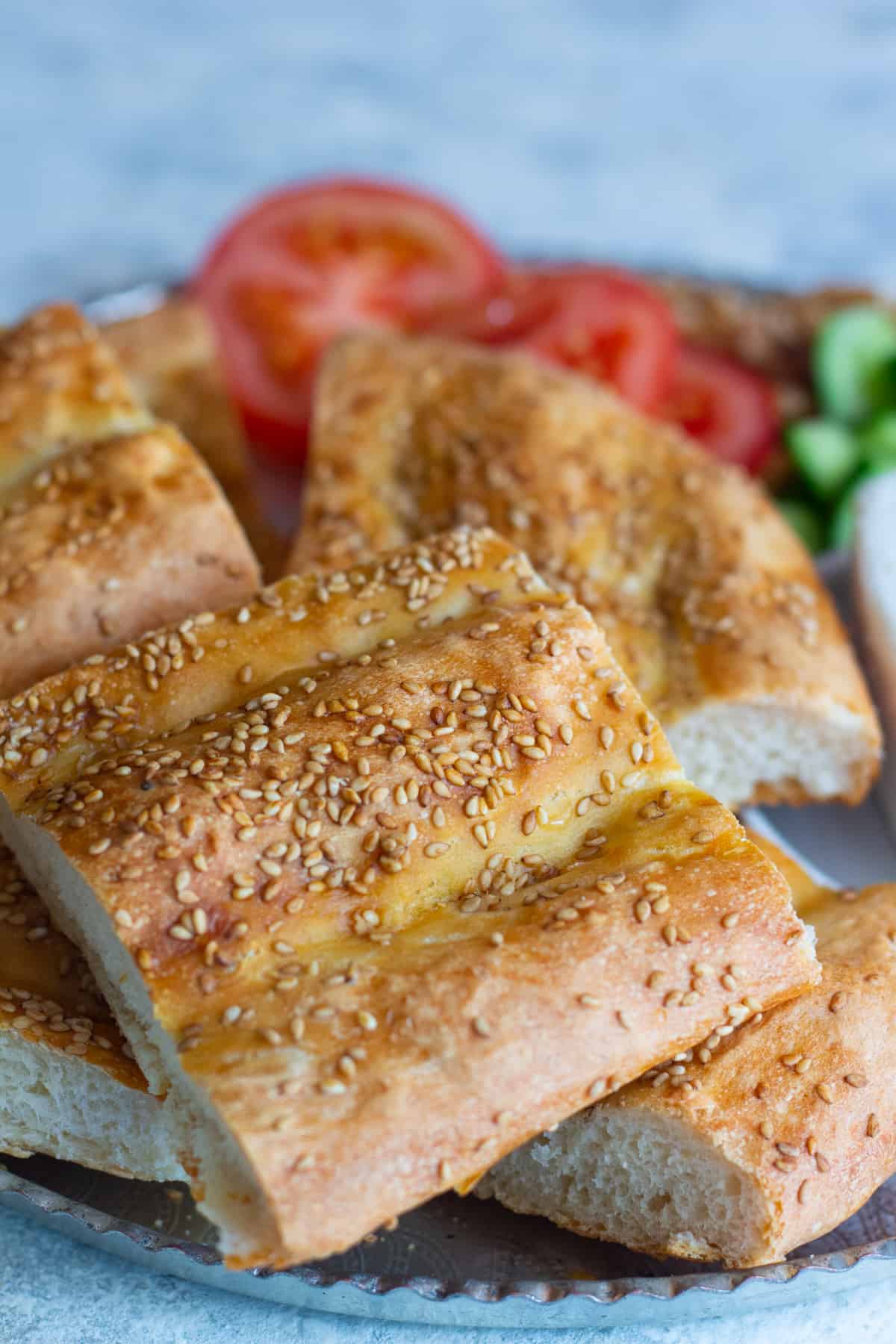 Nan barbari is a classic Persian bread that’s easy to make. With a nice crust and soft inside, this bread is a Persian classic that everyone loves. Barbari is easy to make and goes perfectly with some cheese and walnuts! #Persianrecipes #Persianfood #Breadrecipes #Easybreadrecipes