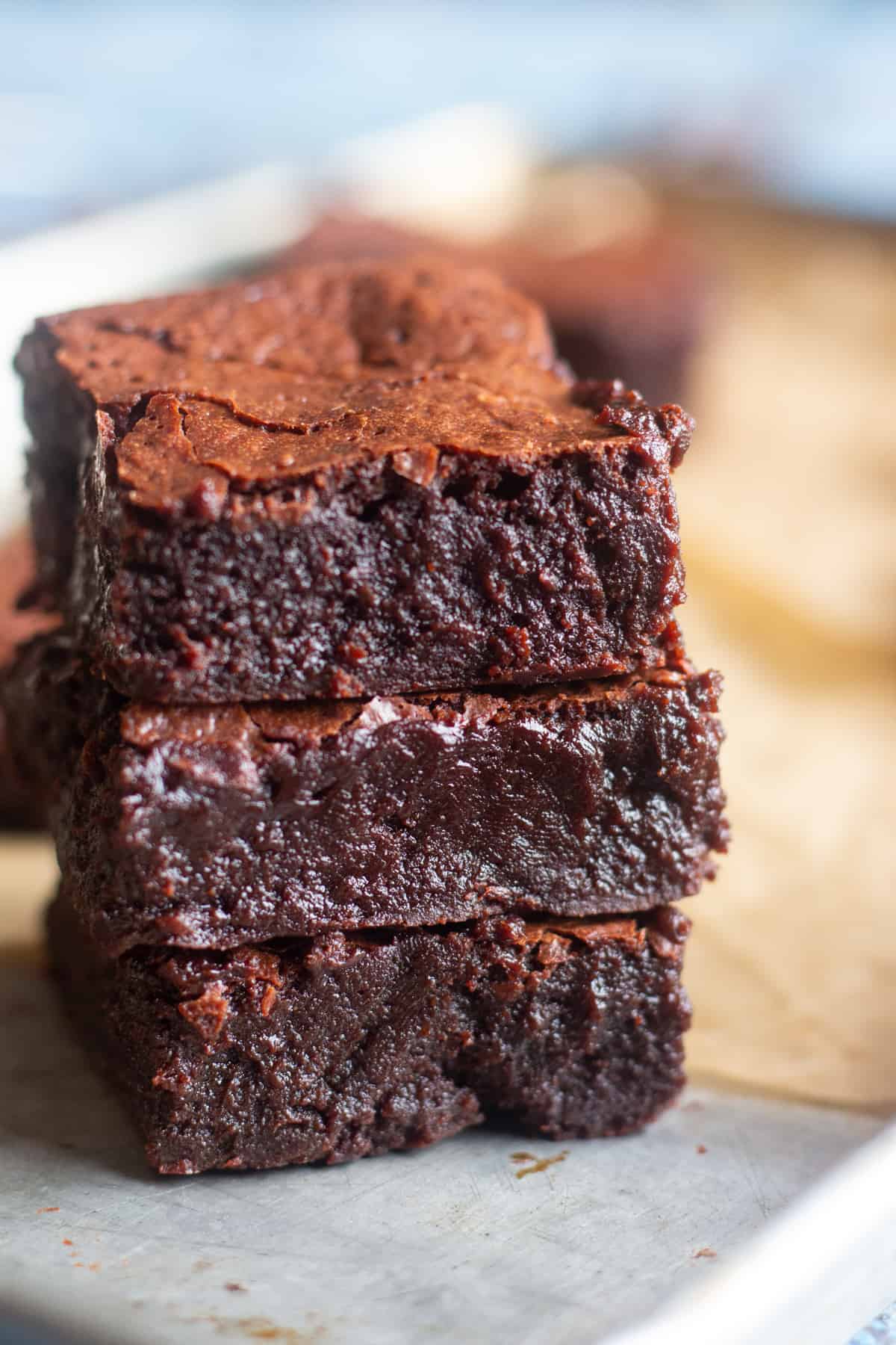 Flourless brownies are rich and fudgy, and they're made with only 6 ingredients! These flourless brownies are naturally gluten free and super moist! 