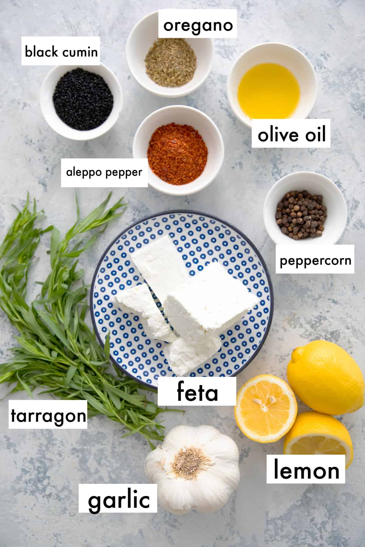 To make this recipe you need feta, olive oil, spices, herbs and garlic. 