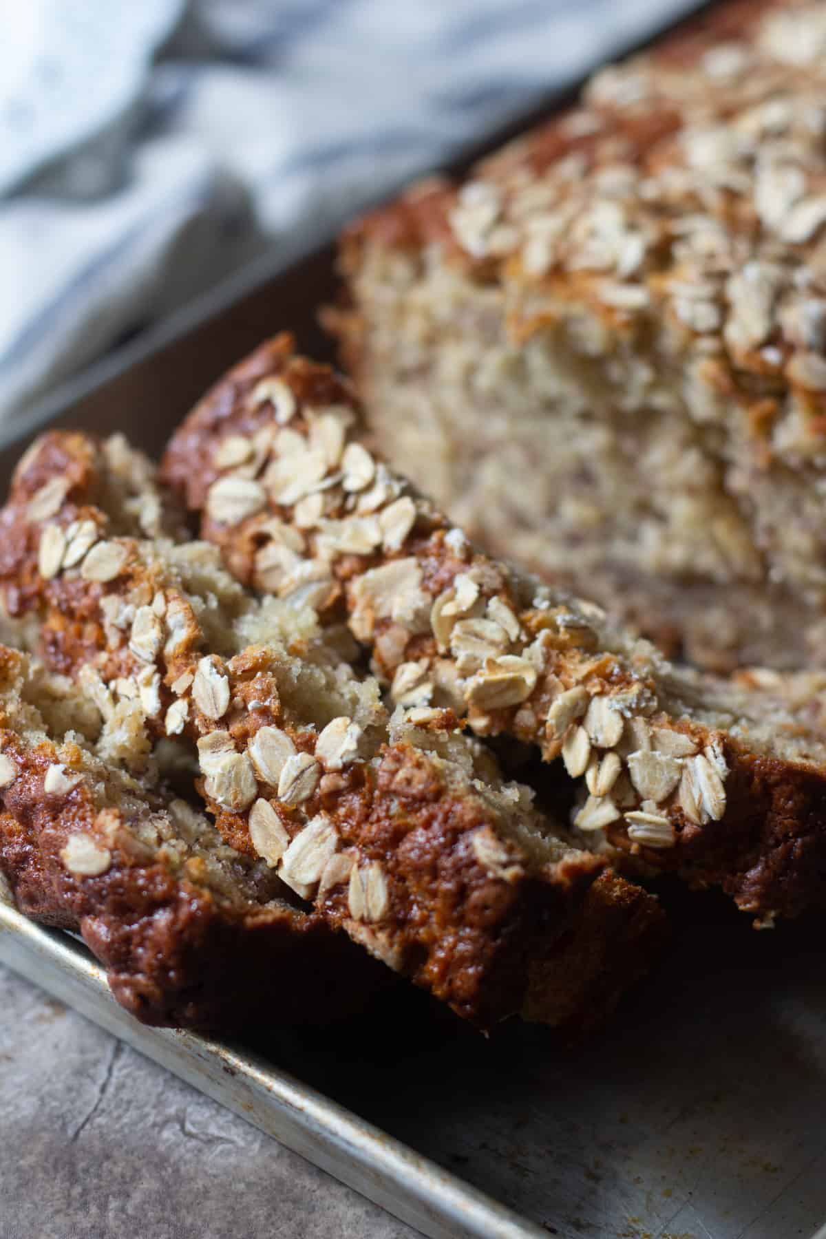Healthy oatmeal banana bread is great for breakfast with some butter. 