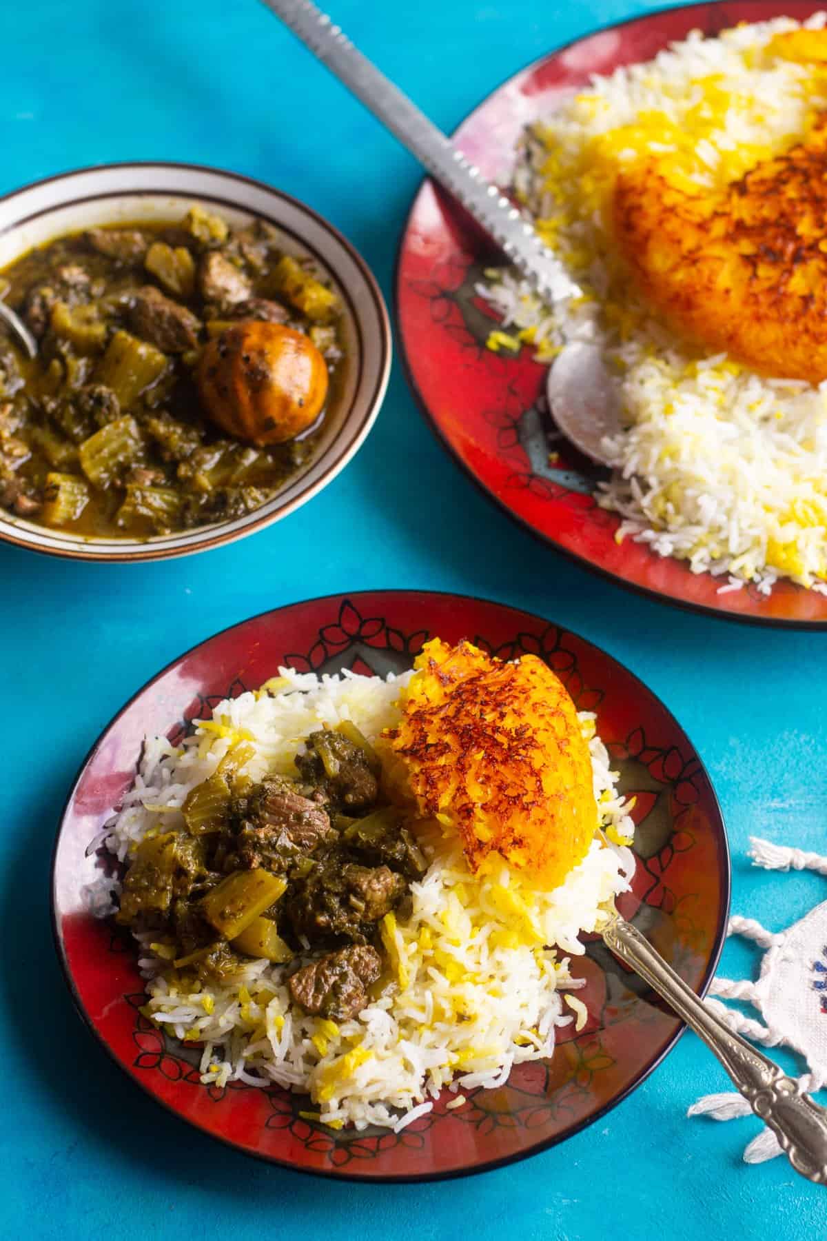 Serve rice and celery stew khoresht karafs on a plate.