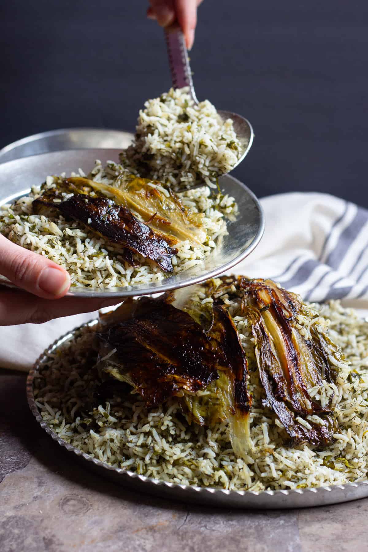 Sabzi Polo is a delicious Persian herb rice that's served with fish for Persian new year. 