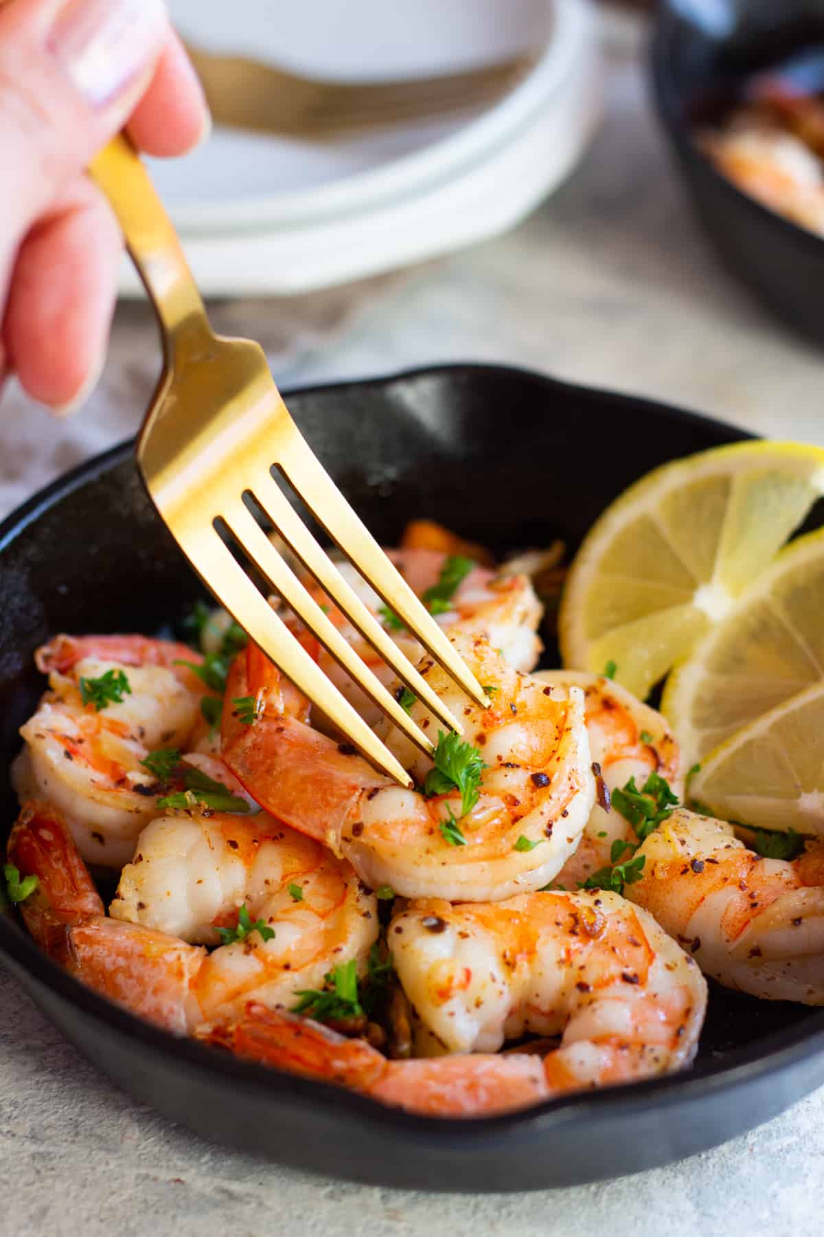 Shrimp is cooked when it's no longer pink. Make sure not to overcook the shrimp. 