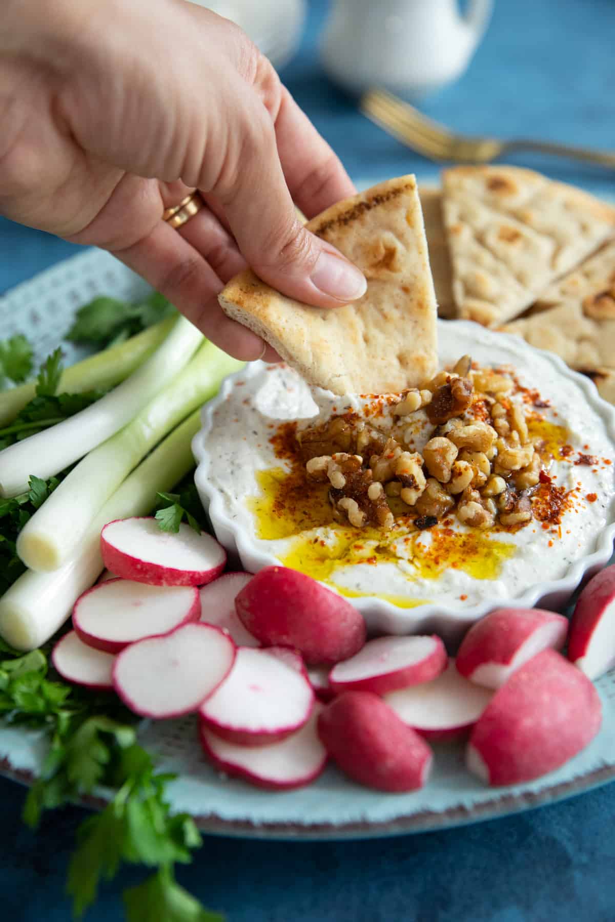 pita bread dipped into whipped feta. 