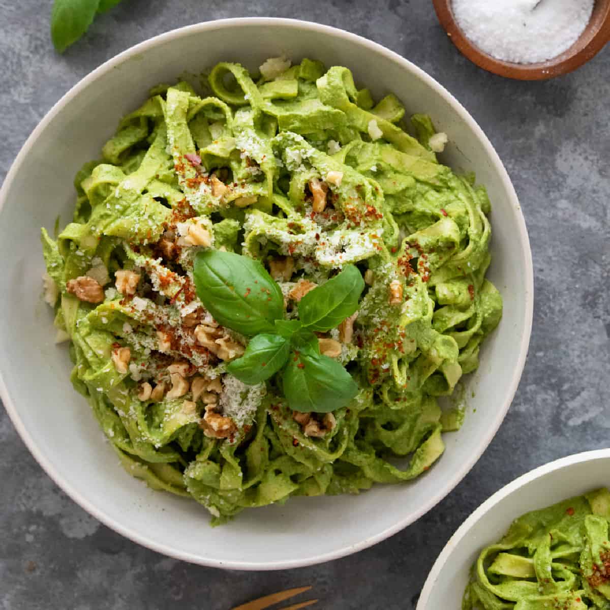 This spinach pesto pasta is creamy and rich, plus it's loaded with vegetables. Easy to make and ready in 30 minutes, this vegetarian pasta is both healthy and delicious.
