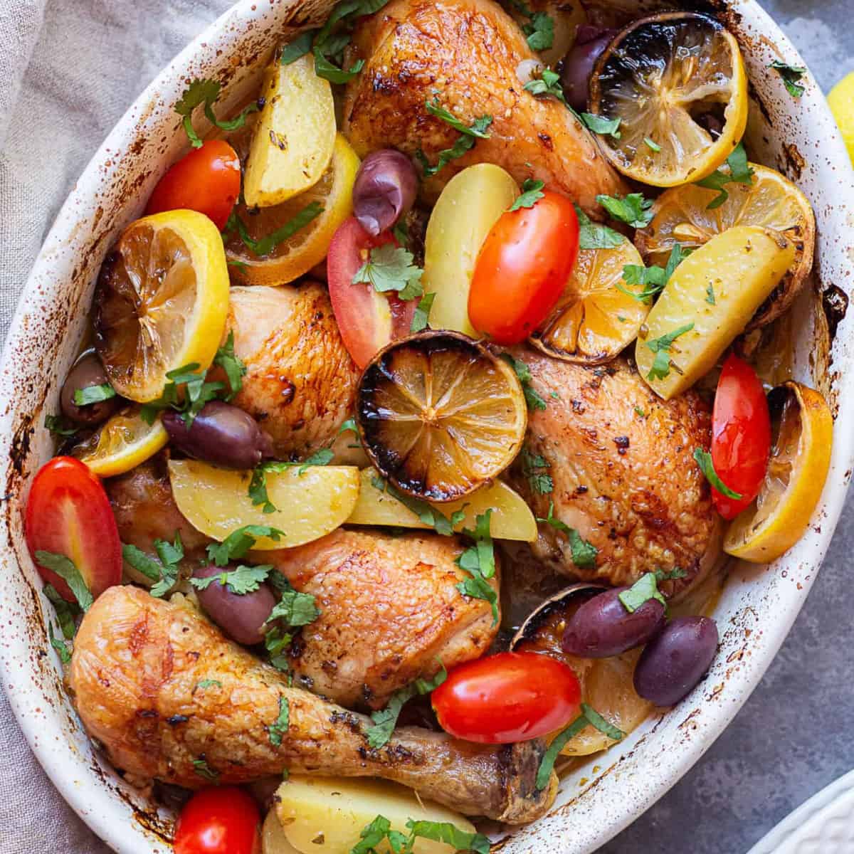 This Greek chicken and potatoes is the perfect dinner. Made in one pan with lots of garlic and lemon, every bit of this baked chicken and potatoes is juicy and packed with flavor.
