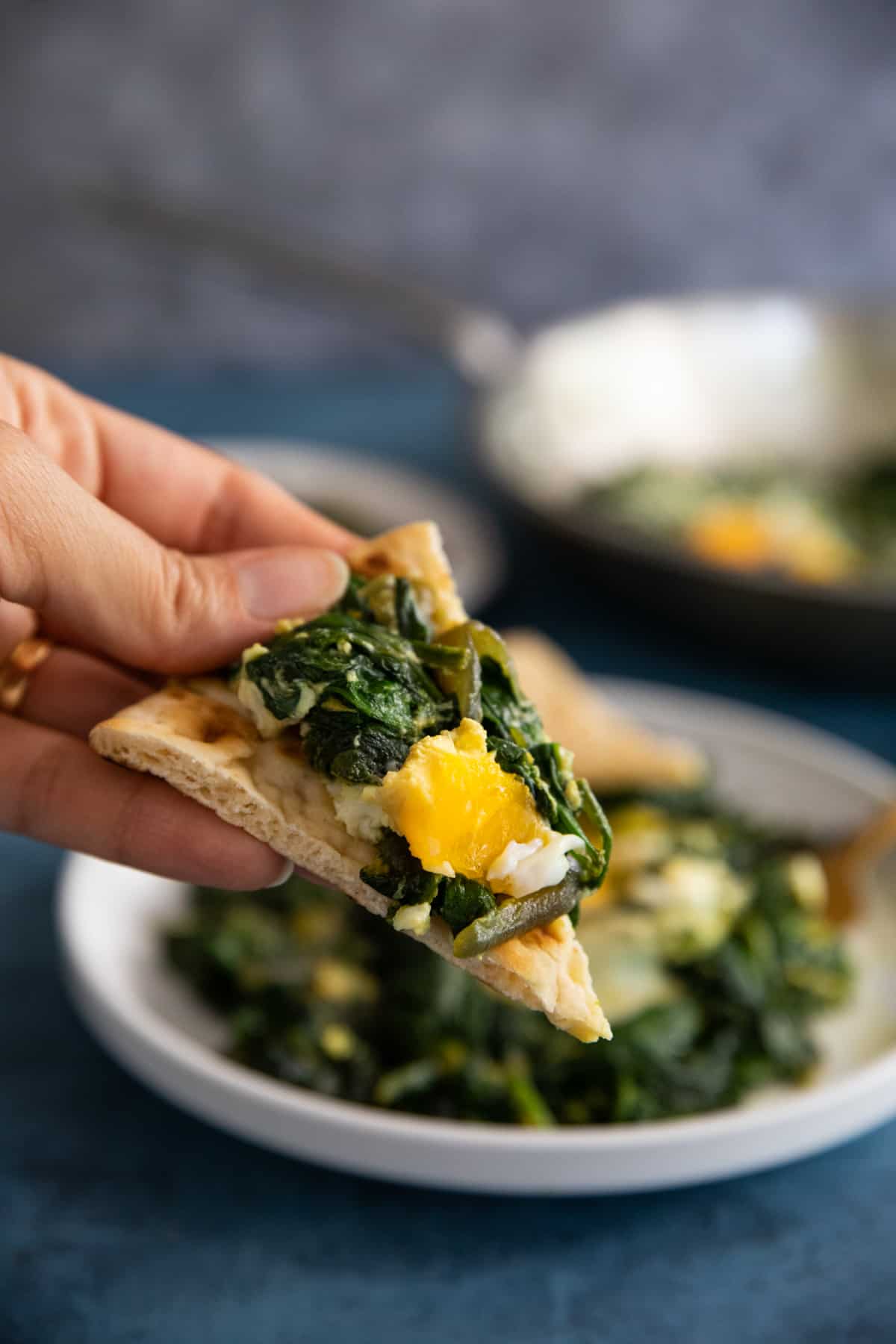 Spinach and eggs, Persian style! This one pan breakfast is easy, healthy and ready in only 20 minutes. You only need a handful of ingredients to make this delicious egg recipe.
