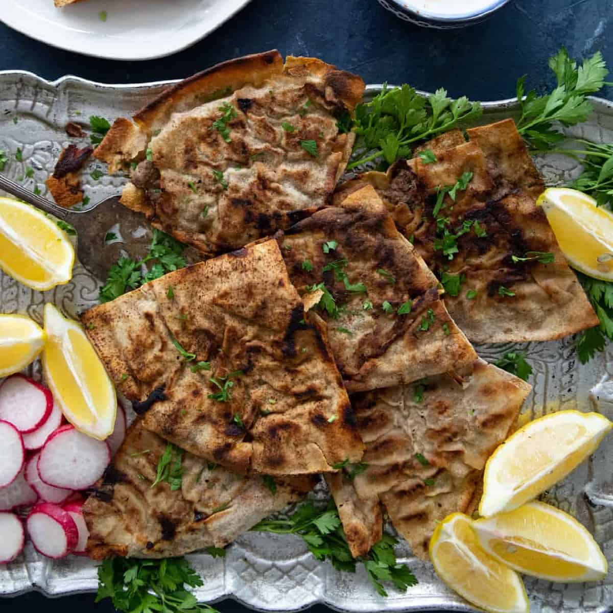 Arayes are Lebanese meat stuffed pitas that are so easy to make. This classic Middle Eastern street food is ready in 20 minutes, ideal for a weeknight dinner. Follow along to learn how to make delicious beef arayes at home with just a few ingredients!
