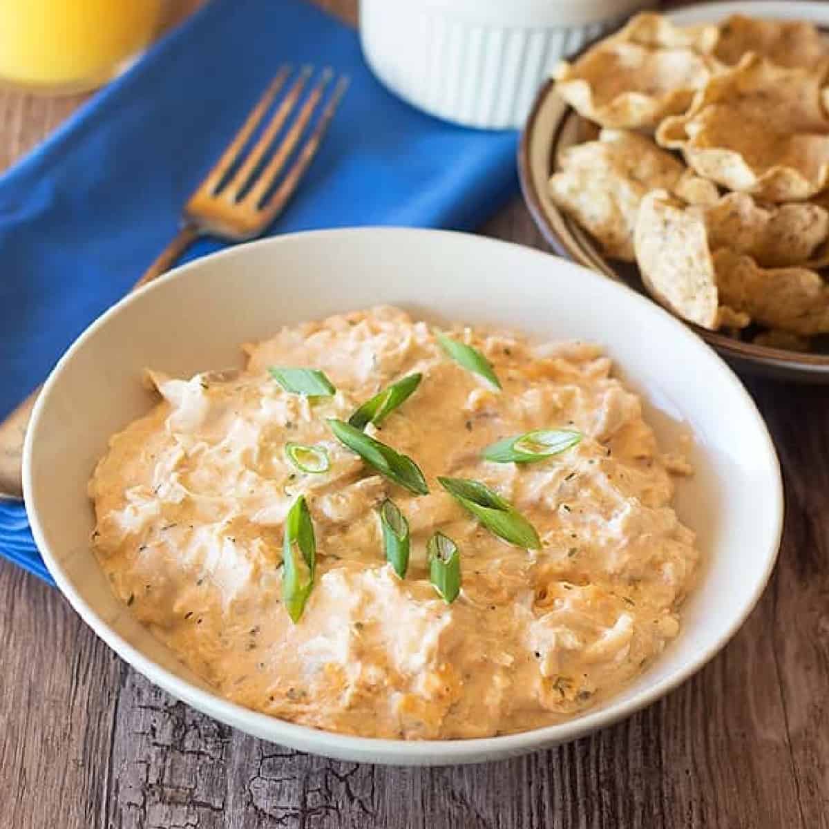An easy buffalo chicken dip recipe made with shredded chicken and buffalo sauce. Instructions for oven, crock pot and instant pot are included. 
