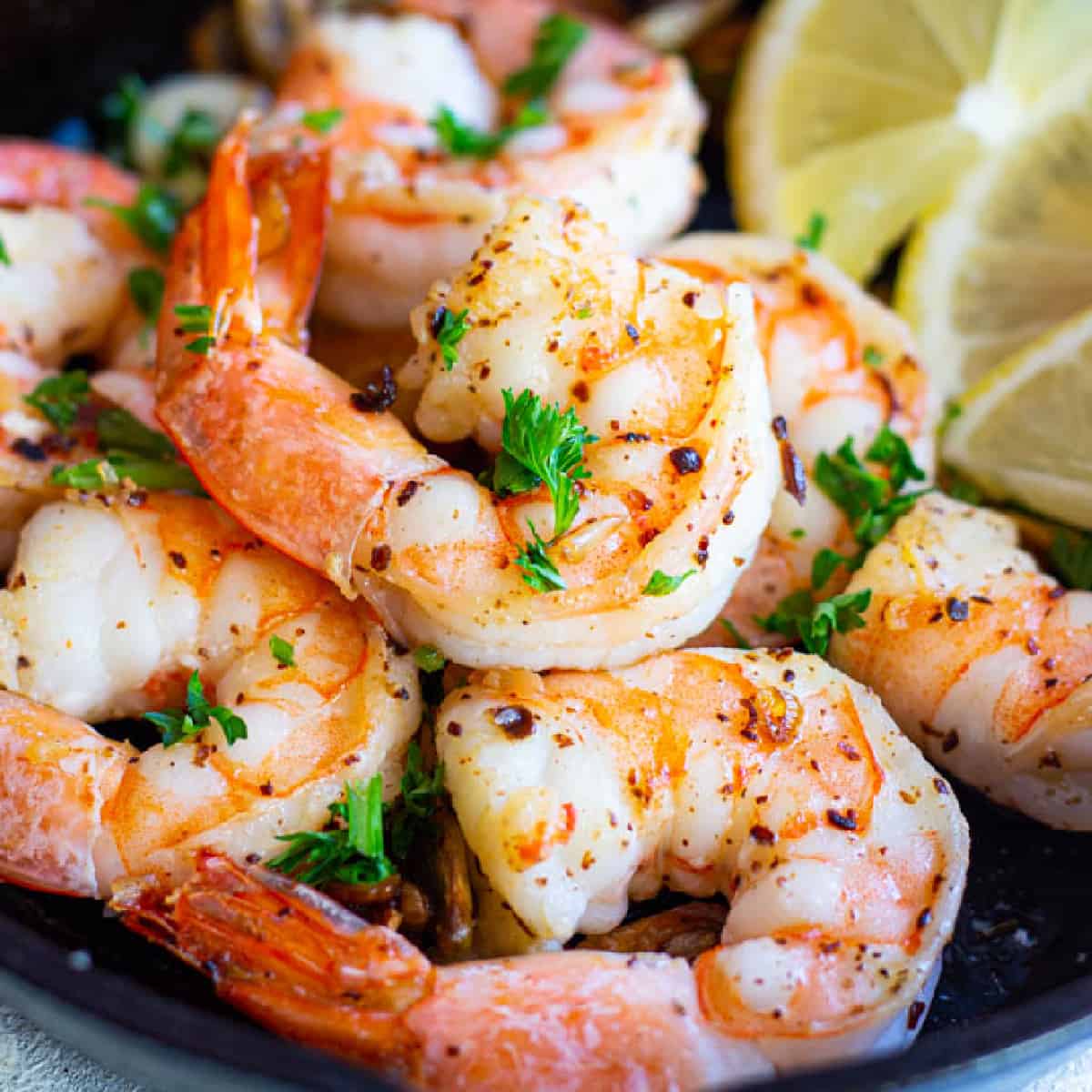Gambas al ajillo, also known as garlic shrimp, is a classic Spanish tapa that's ready in 10 minutes. Delicious shrimp cooked in olive oil with a lot of garlic, it can’t get any better! 
