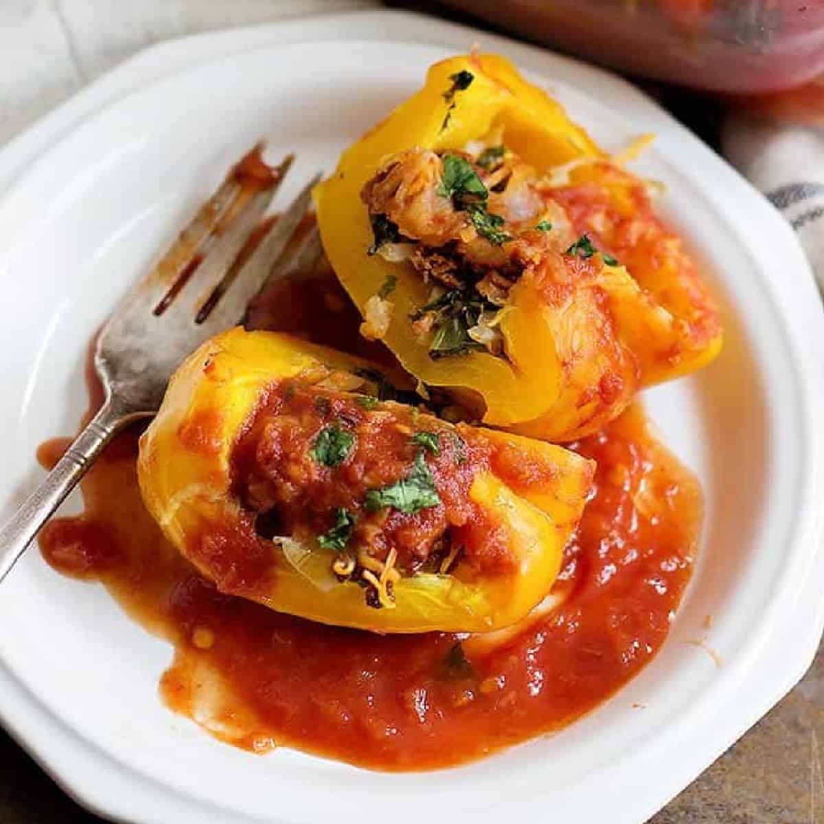 These Spicy Stuffed Peppers are perfect for weeknights. The combination of risotto and chorizo topped with delicious salsa is very tempting!