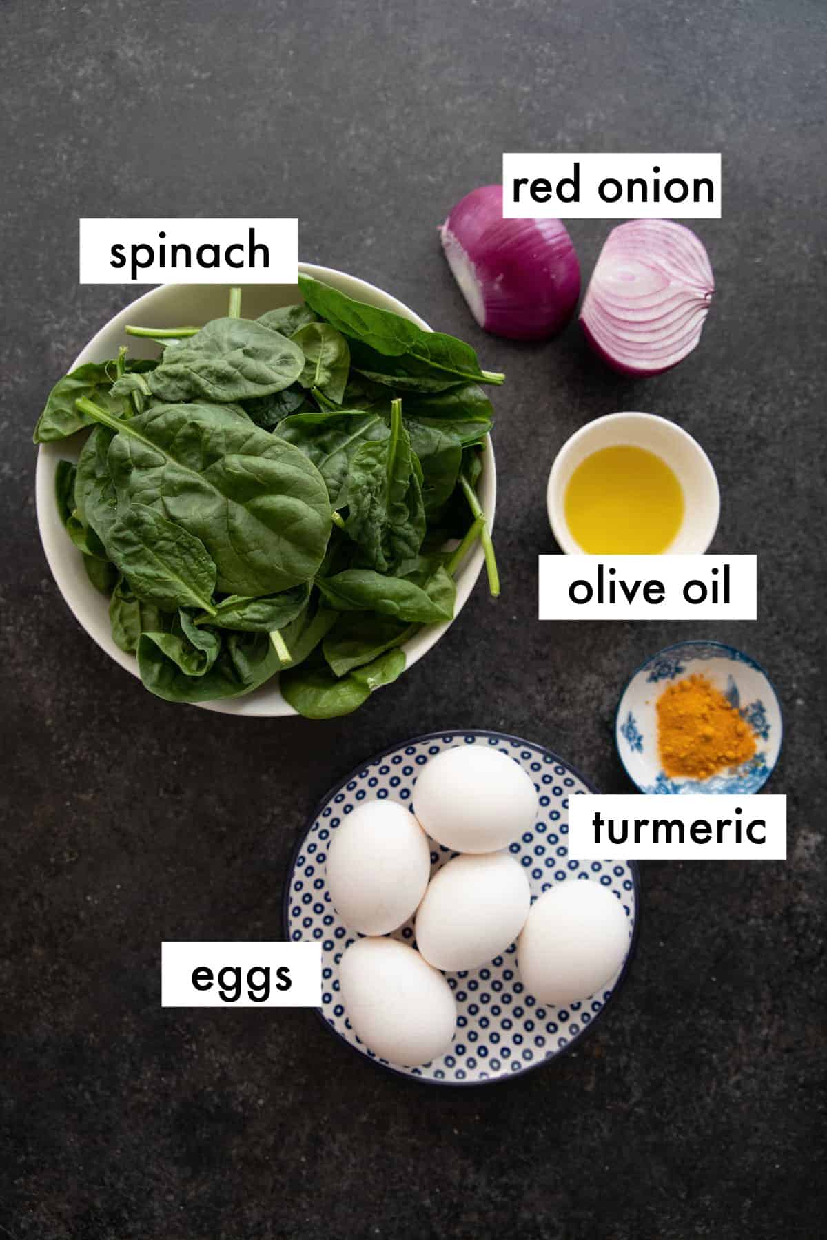 ingredients are red onion, spinach, turmeric, salt and pepper, olive oil and eggs. 