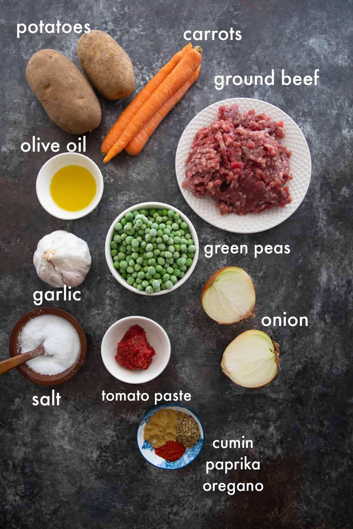 to make ground beef stew you need olive oil, onion, garlic, ground beef, potatoes, carots, tomato paste and spices. 