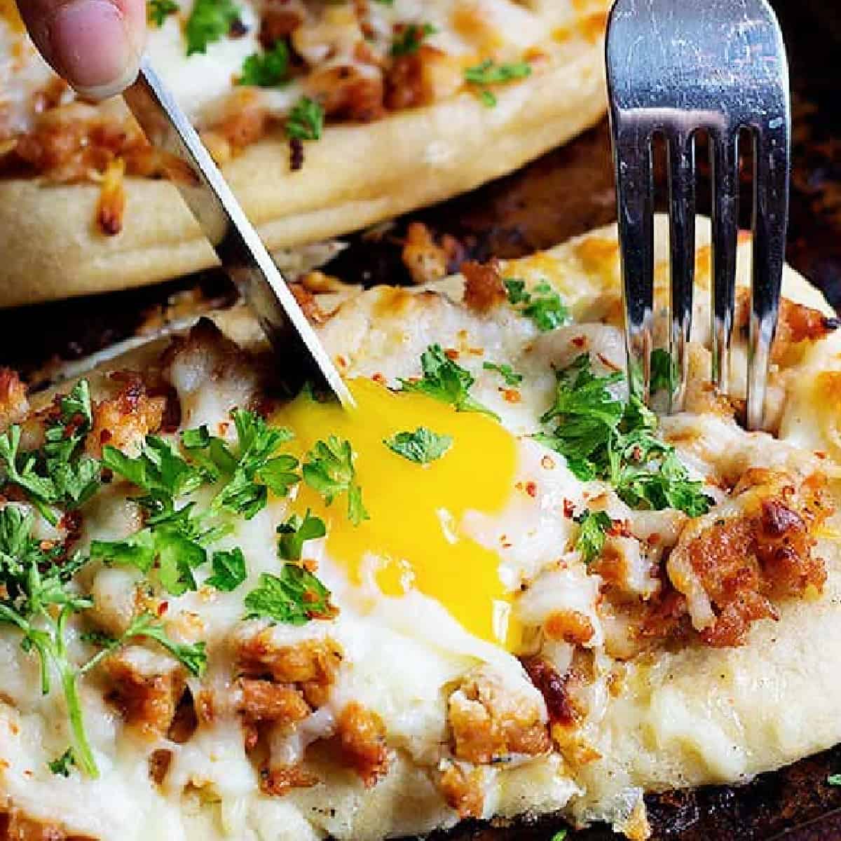 Make this Breakfast Pizza Recipe in no time using naan and only three ingredients! All done and ready in less than thirty minutes, perfect for a brunch party! 
