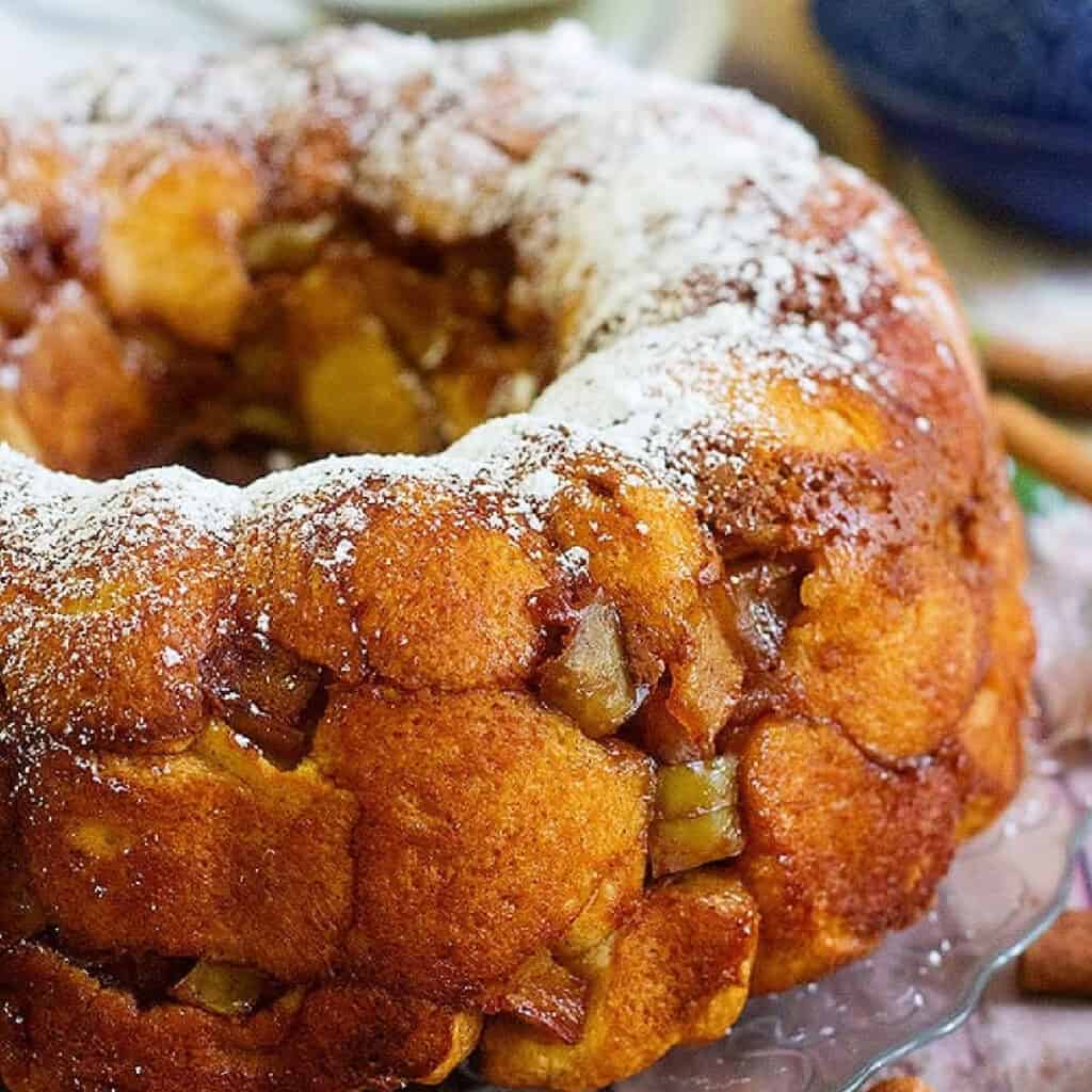Apple Pie Monkey Bread made from scratch is the perfect family breakfast! The amazing combination of apples and cinnamon makes this ooey gooey bread so delicious! 
