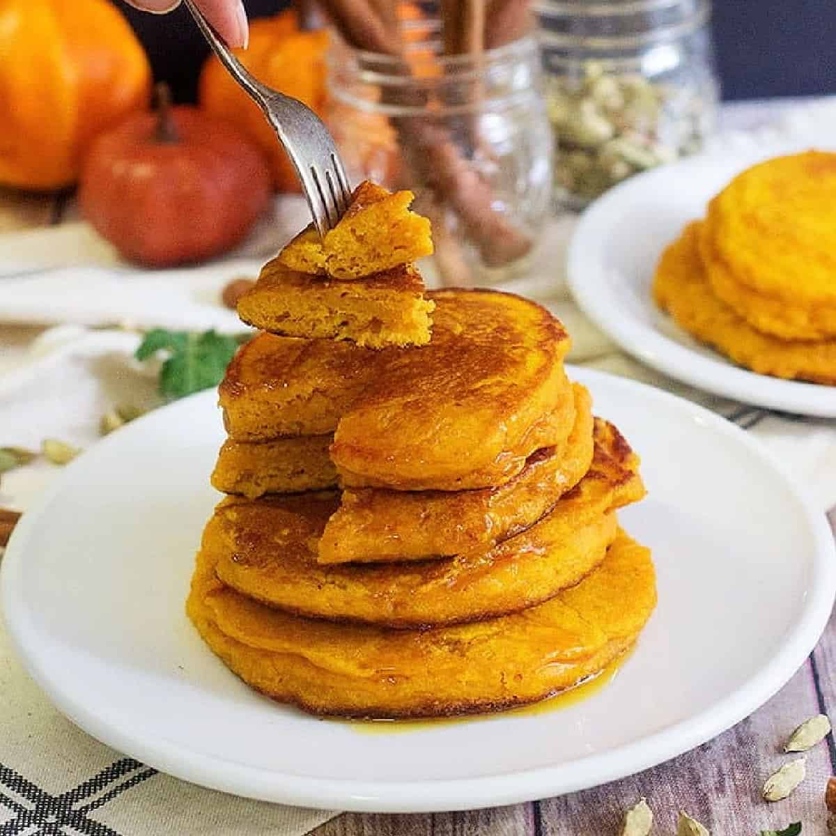 Learn How to Make Pumpkin Pancakes for breakfast and brunch. These pancakes are fluffy and full of delicious flavors, and are ready in no time!

