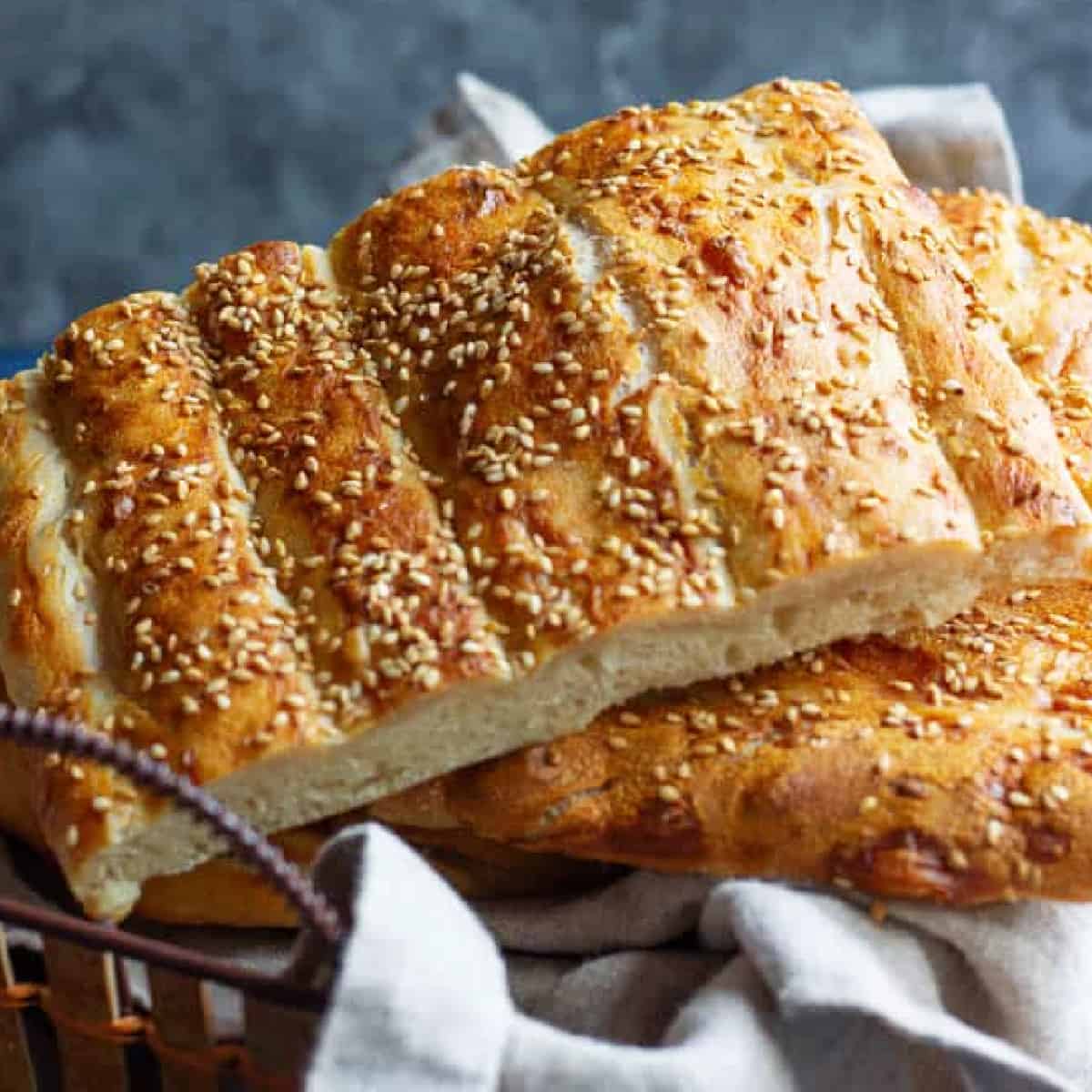 Sourdough barbari is so delicious. The texture and flavor is exactly the same as the ones in Iran. Topped with a simple glaze and sesame seeds, this bread is perfect for breakfast!
