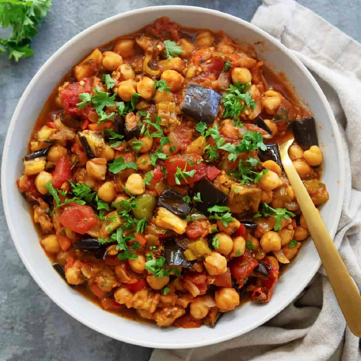 This recipe for eggplant chickpea stew is surprisingly easy and stress-free. It's vegan, gluten-free and dairy-free - perfect for picky eaters!