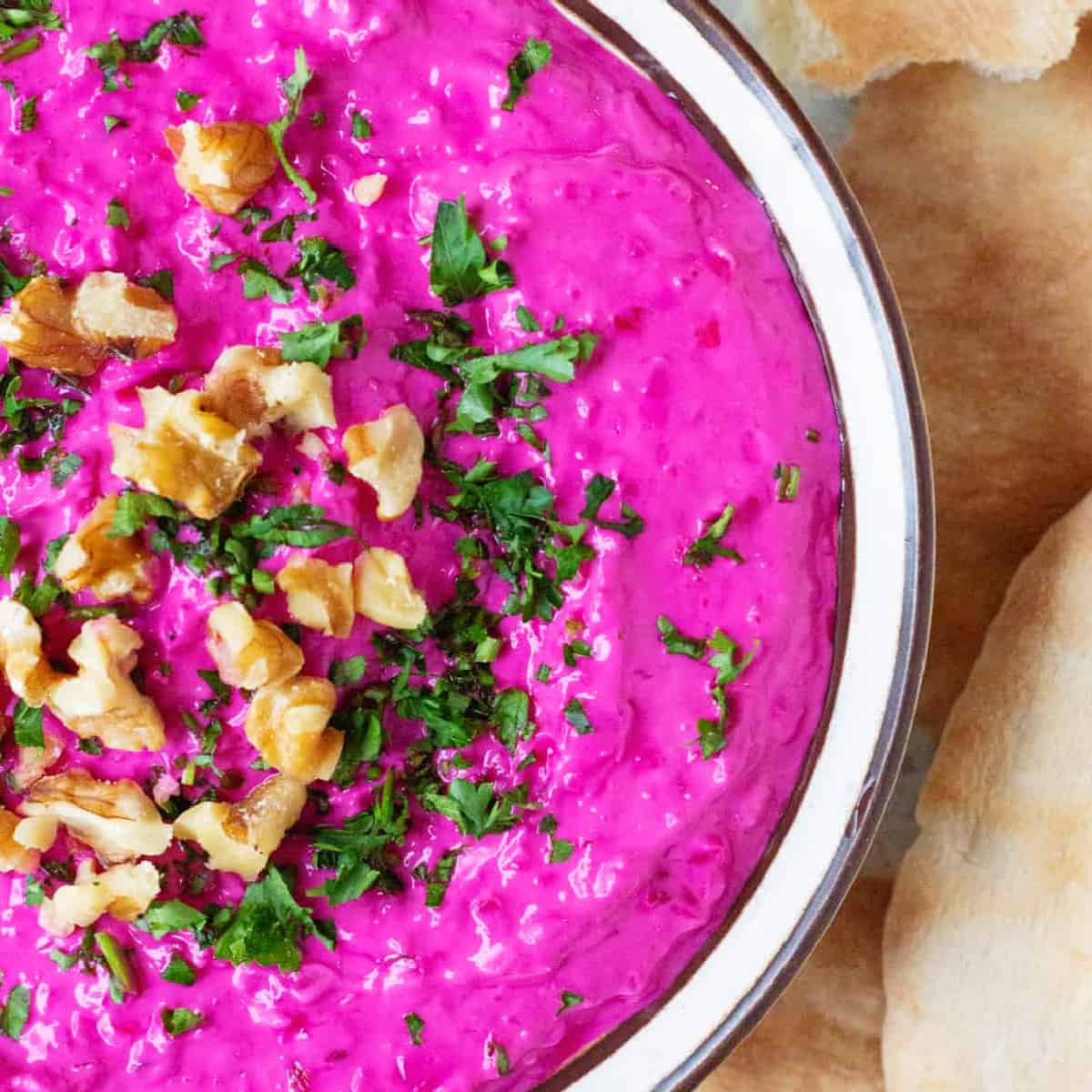 Persian beet dip is an eye-popping addition to any spread. The bright color and flavor makes this easy 10-minute yogurt-based dip extra fun. You can use store-bought cooked beets or cook them from scratch.
