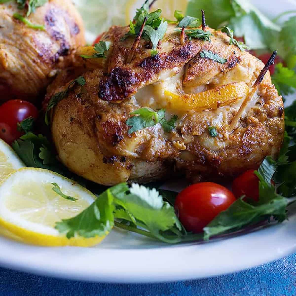 Cheese stuffed chicken breast makes a delicious dinner that's low carb and easy. Learn how to make these garlic lemon stuffed chicken breast at home with a few ingredients.