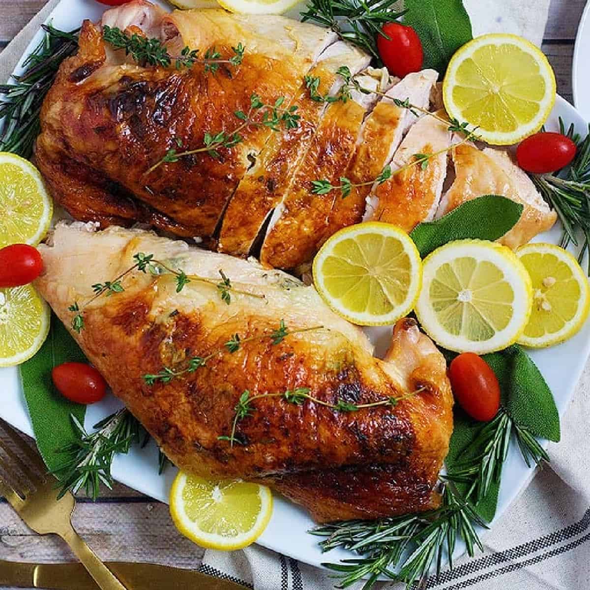 This herb roasted turkey breast recipe is perfect for a family dinner or your Thanksgiving table. The combination of herbs, butter and lemon results in a delicious and moist turkey breast.