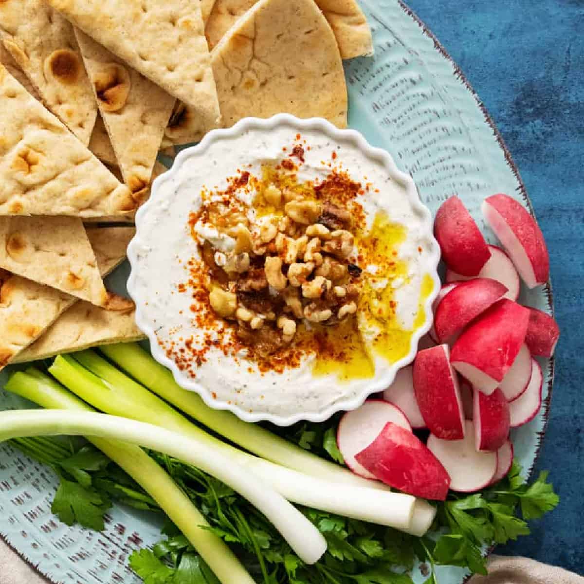 Ready in 10 minutes, this creamy whipped feta dip is super easy and tasty. Top with walnuts and serve with pita for a unique mezze at any gathering! Follow along to learn about which feta to select and how to make the best feta dip ever!
