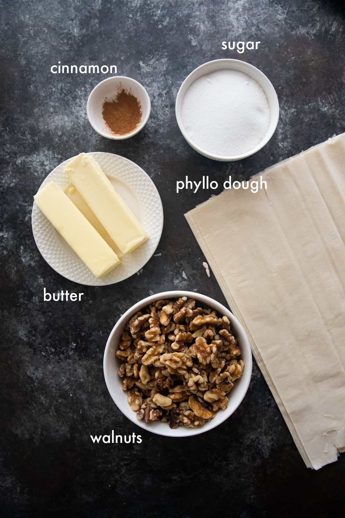 to make baklava you need butter, phyllo dough , walnuts and sugar. 