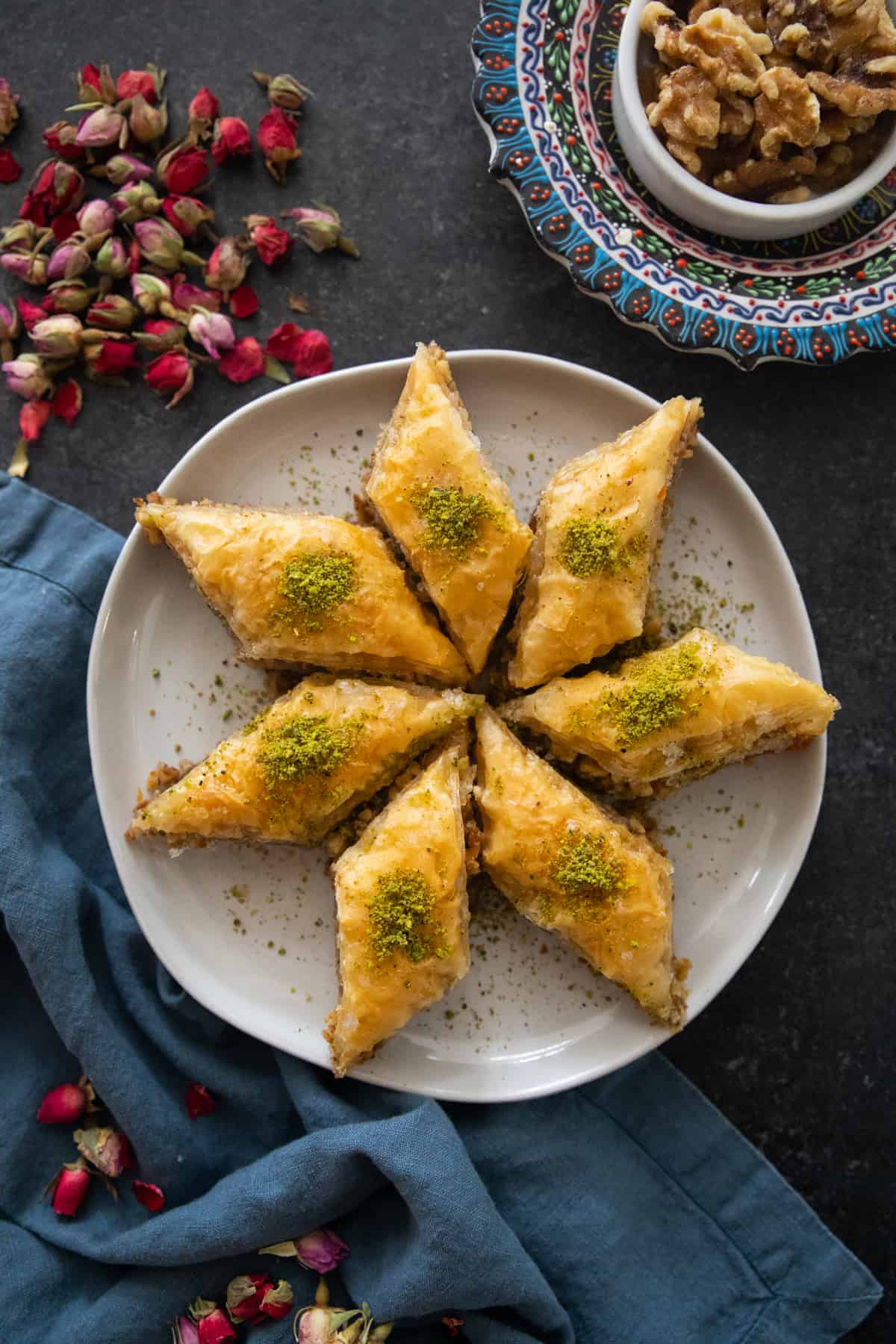 a few slices of walnut baklava on a plate. 