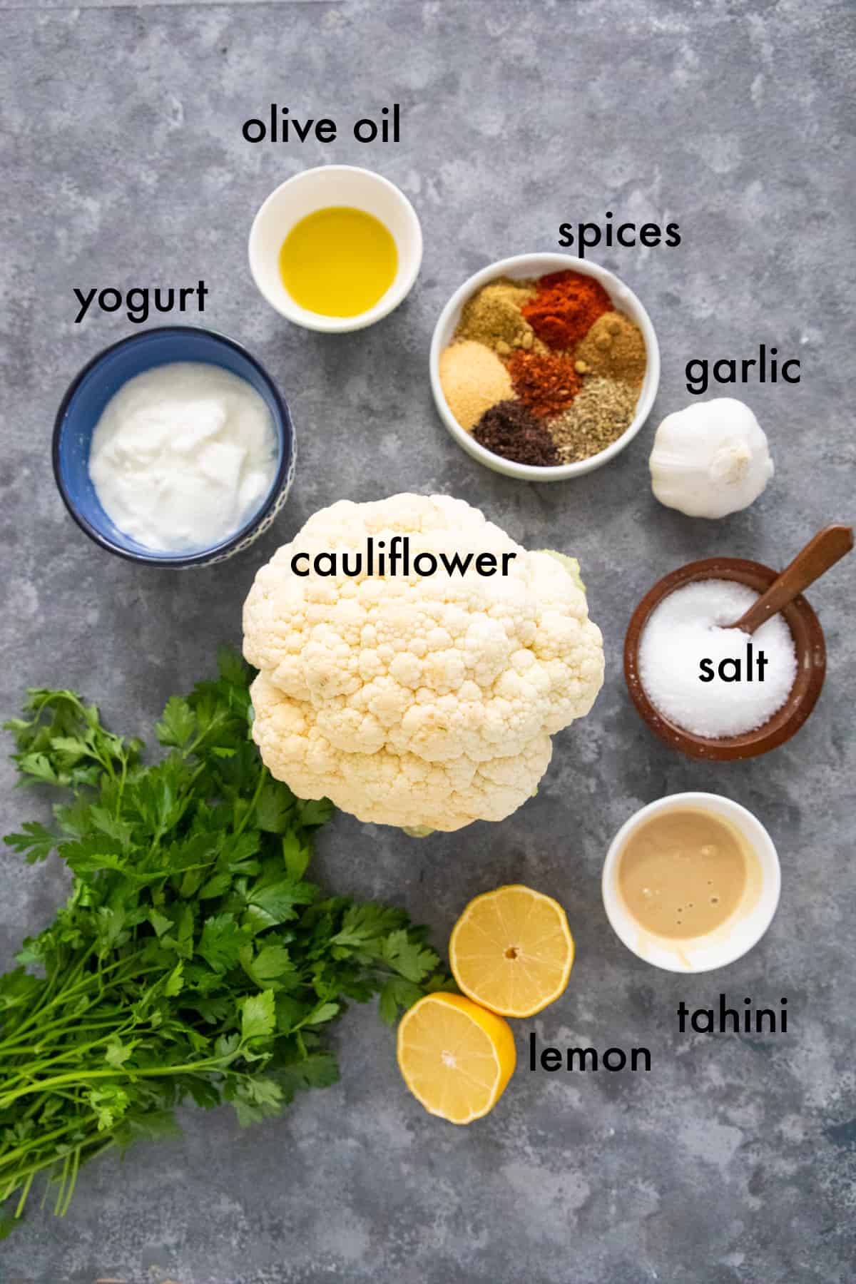 To make this recipe you need cauliflower, spices, olive oil, yogurt and tahini plus lemon. 