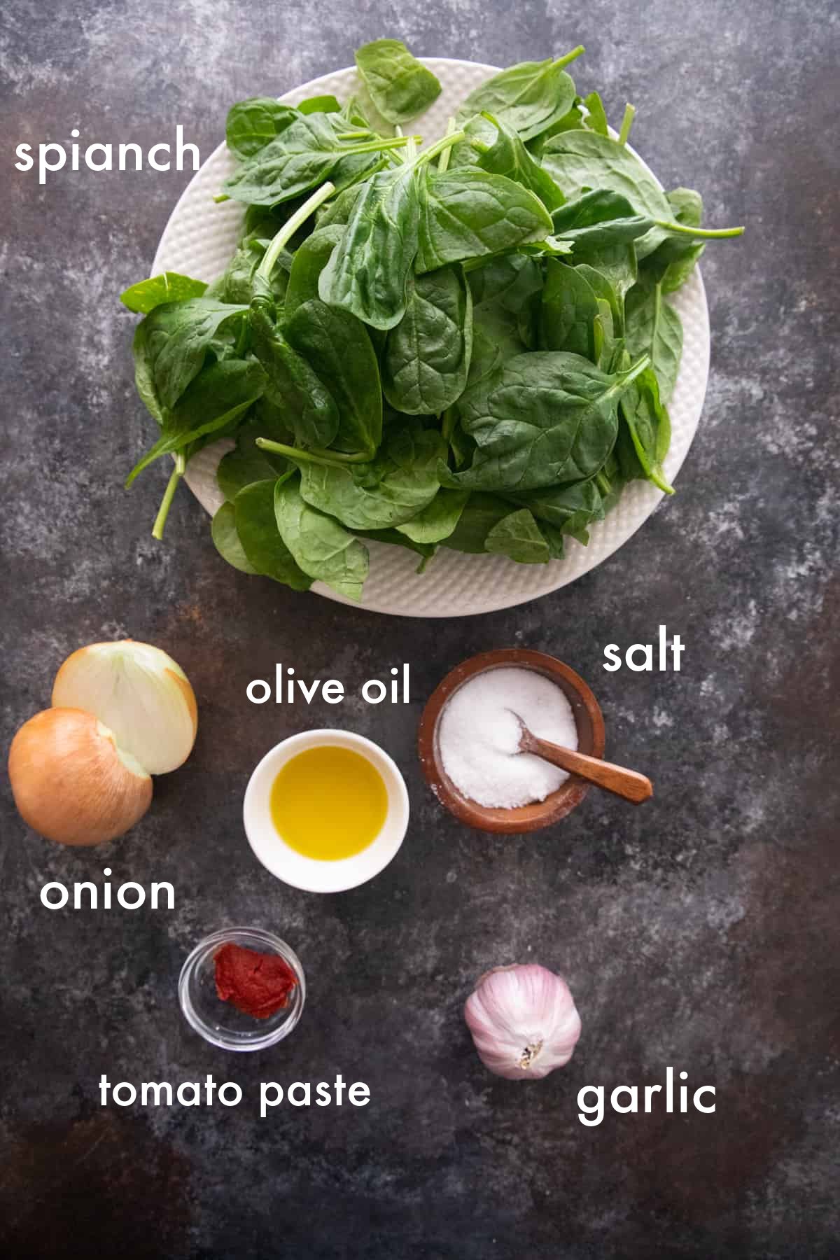 you need spinach, olive oil, tomato paste, onion, garlic and salt for this recipe. 