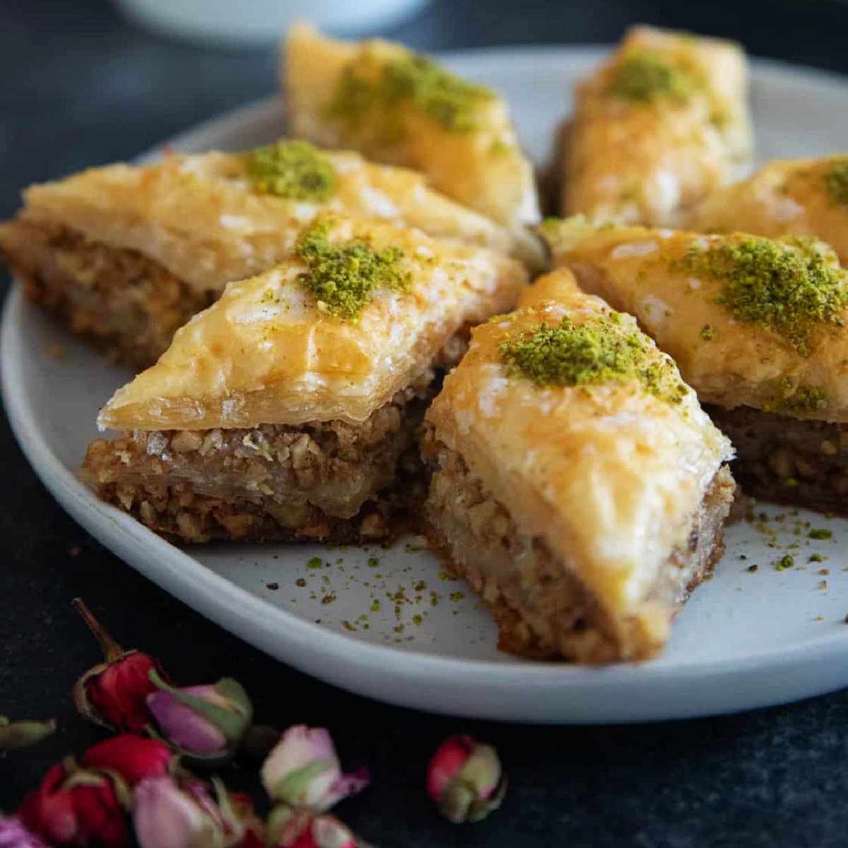 Learn how to make baklava from scratch with my easy tutorial. This delicious dessert is made with flaky phyllo pastry, nuts and simple syrup. You can make this baklava recipe ahead of time and wow everyone!
