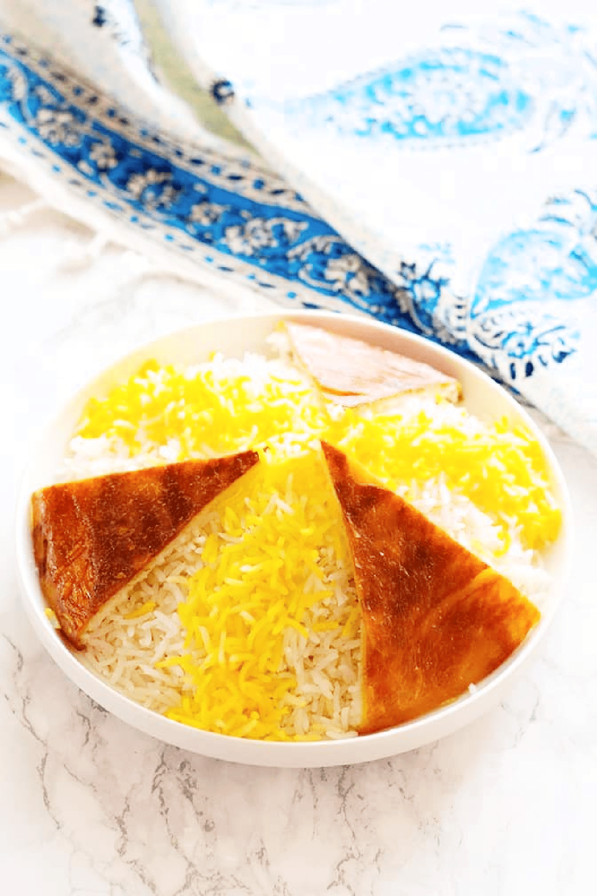 Persian rice is the key element of Persian cuisine. This post will help you master the essential Persian rice with a crispy golden crust, known as tahdig.
